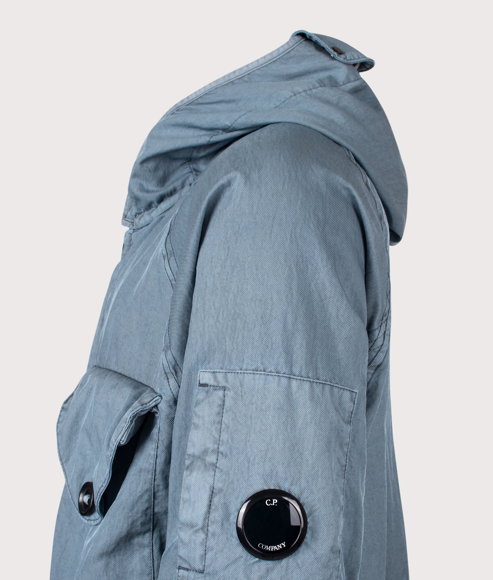 Panama-R Mixed Goggle Jacket in Silver Blue by C.P. Company. Shot by EQVVS. Detail side shot.