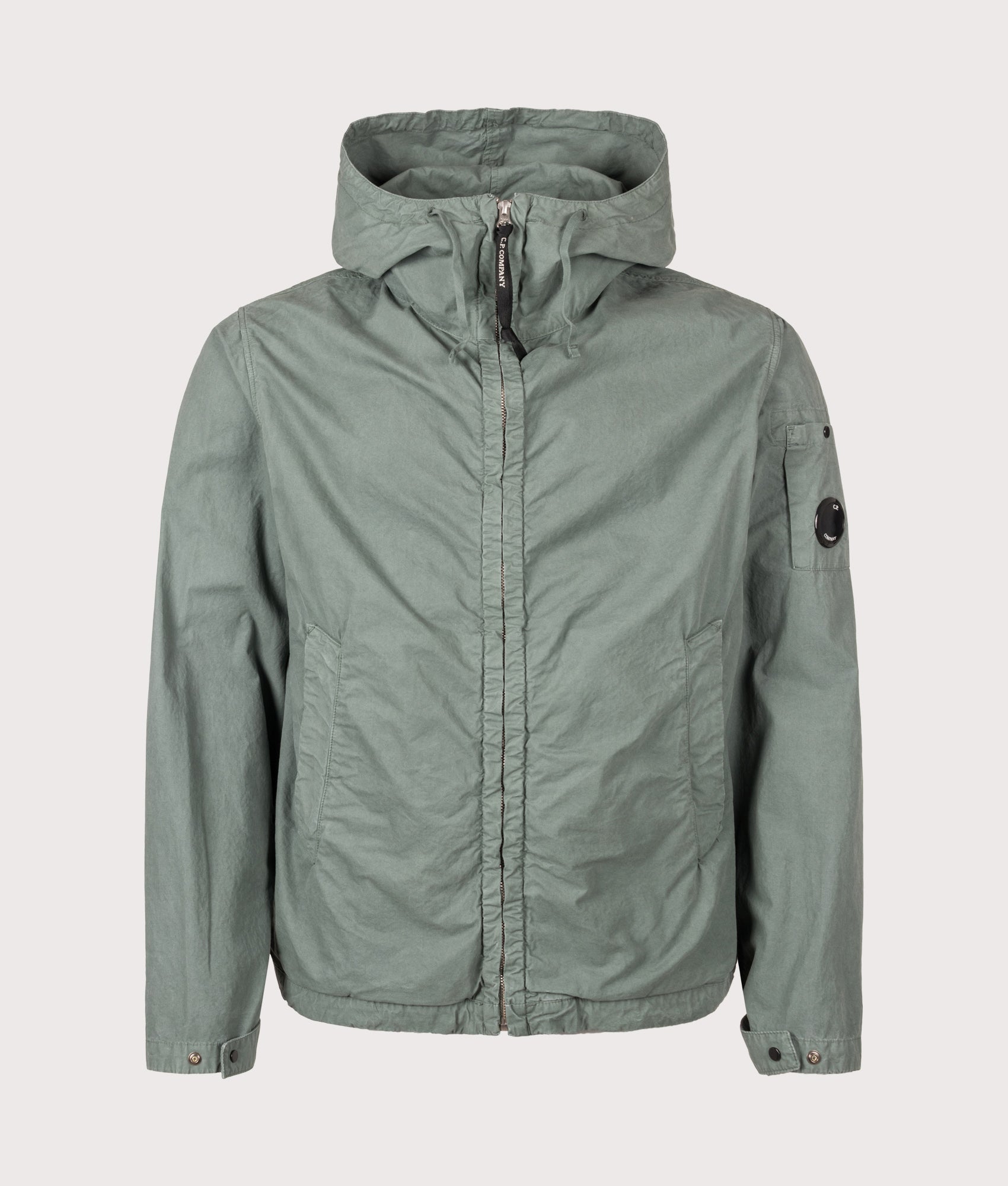 C.P. Company Micro-Reps Hooded Lens Jacket in Laurel Wreath at EQVVS Menswear. Front shot.