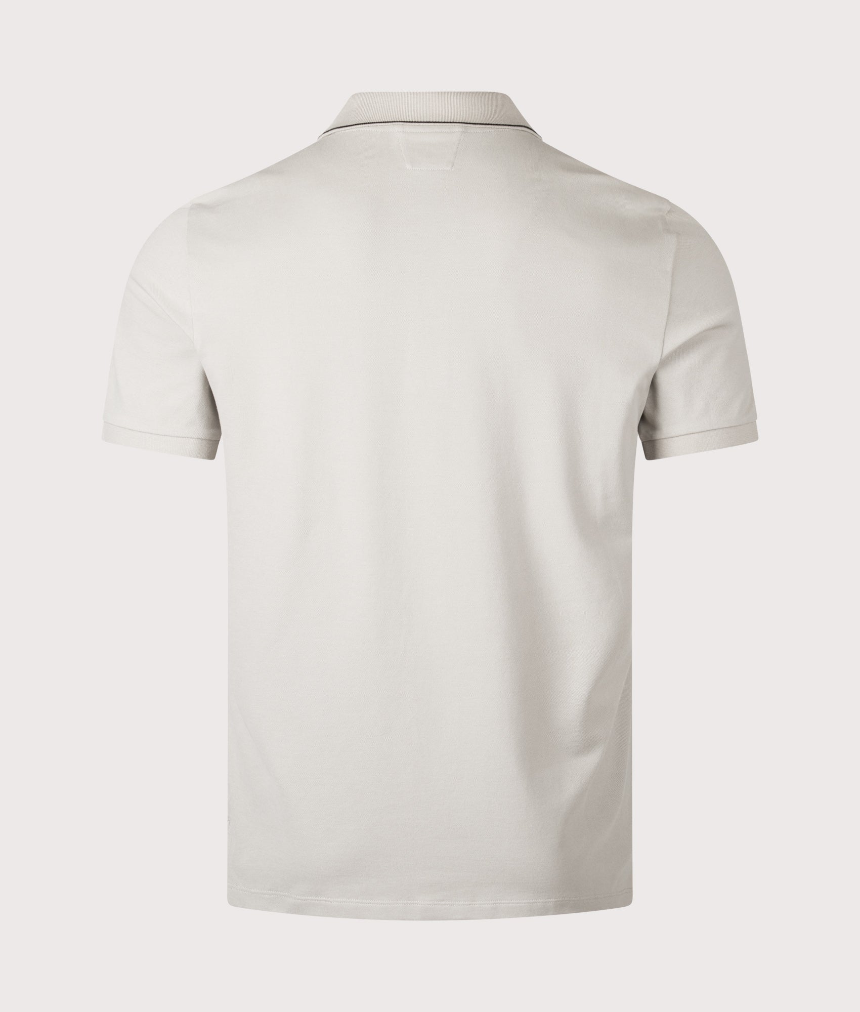 C.P. Company Stretch Piquet Short Sleeve Logo Polo Shirt in Dove at EQVVS Menswear. Back shot.