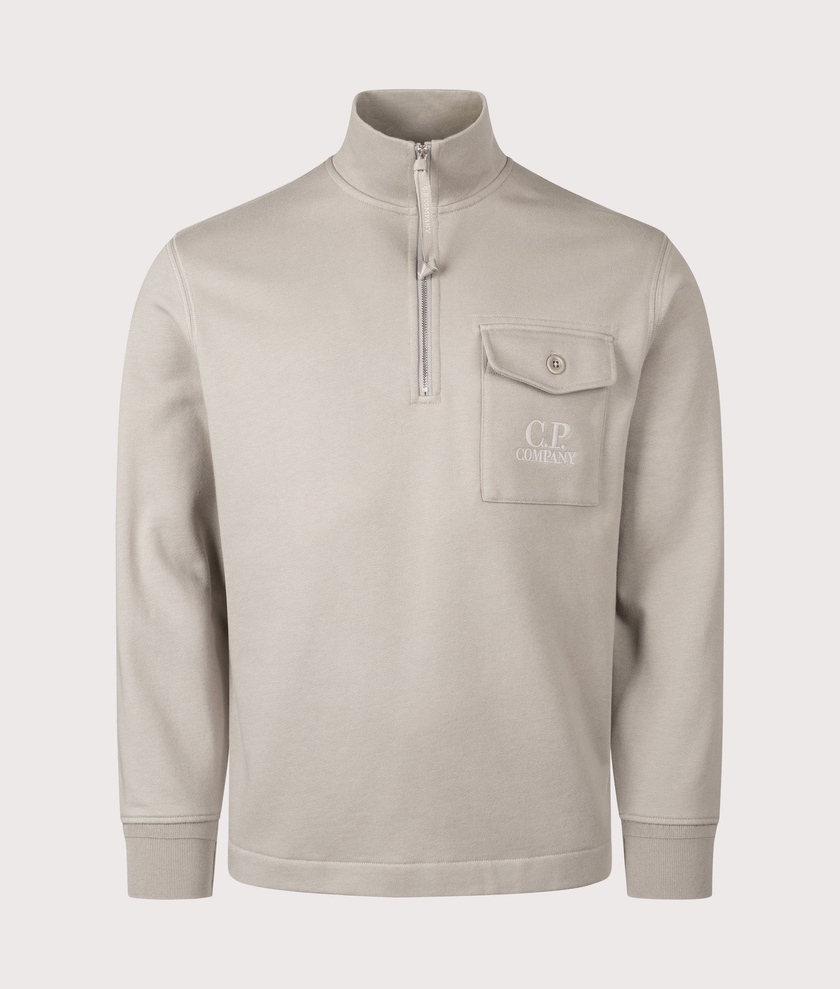 C.P. Company Diagonal Raised Fleece Half Zip Sweatshirt in Dove at EQVVS Menswear. Front shot.
