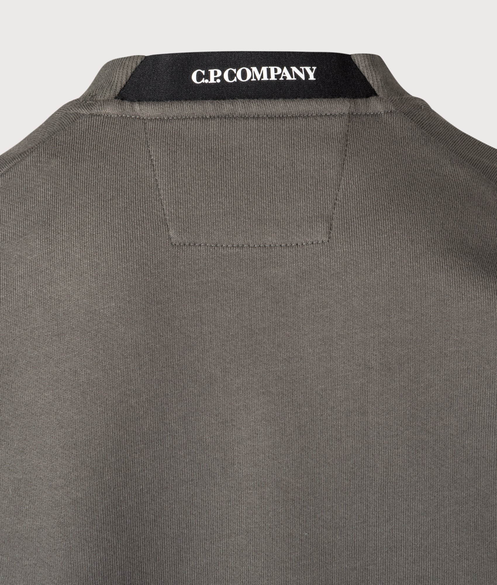 C.P. Company Diagonal Raised Fleece Lens Sweatshirt in Gunmetal at EQVVS Menswear. Second detail shot.