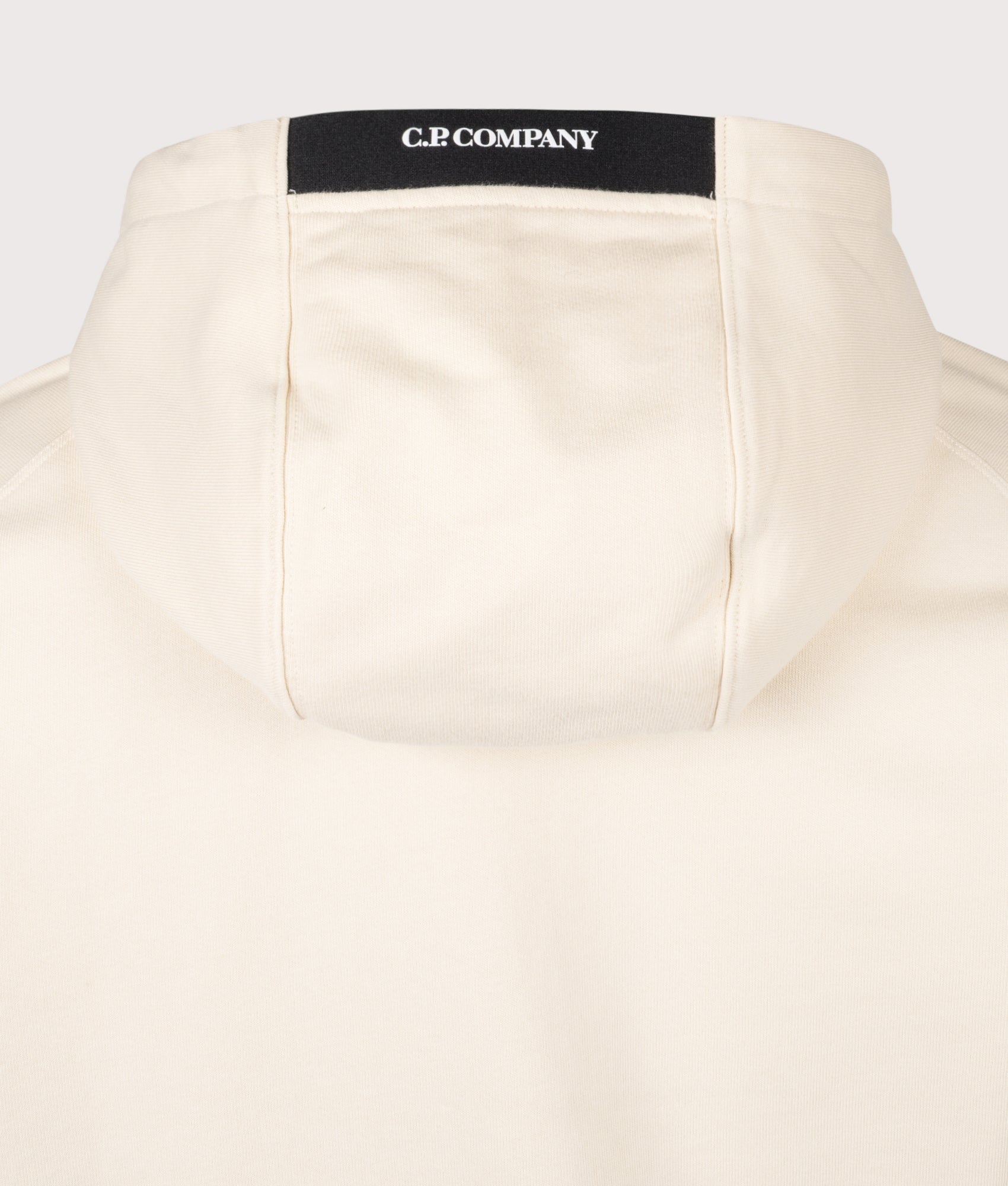 C.P. Company Diagonal Raised Fleece Lens Hoodie in Frozen Dew at EQVVS Menswear. Back detail shot.