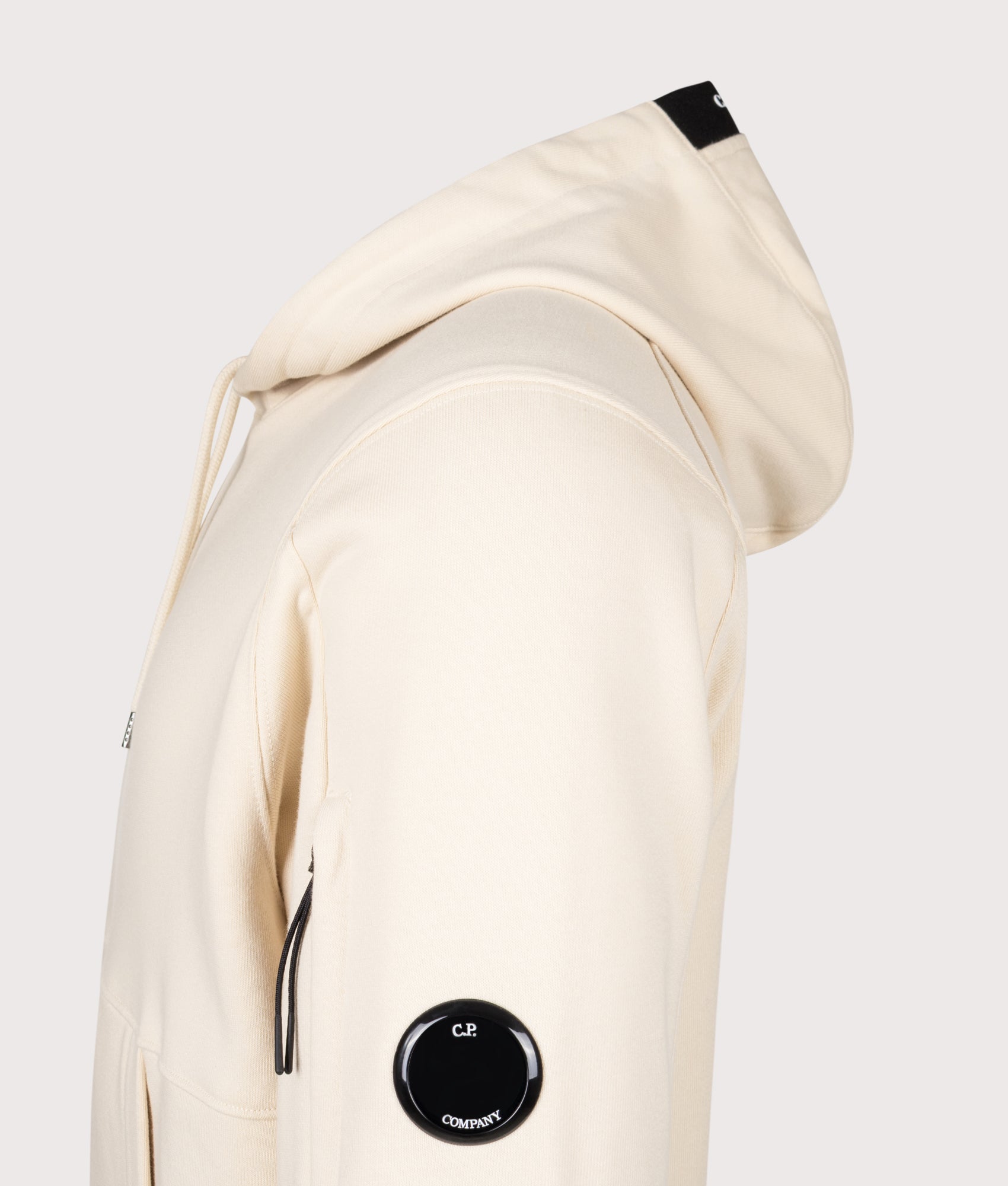 C.P. Company Diagonal Raised Fleece Lens Hoodie in Frozen Dew at EQVVS Menswear. Detail shot.