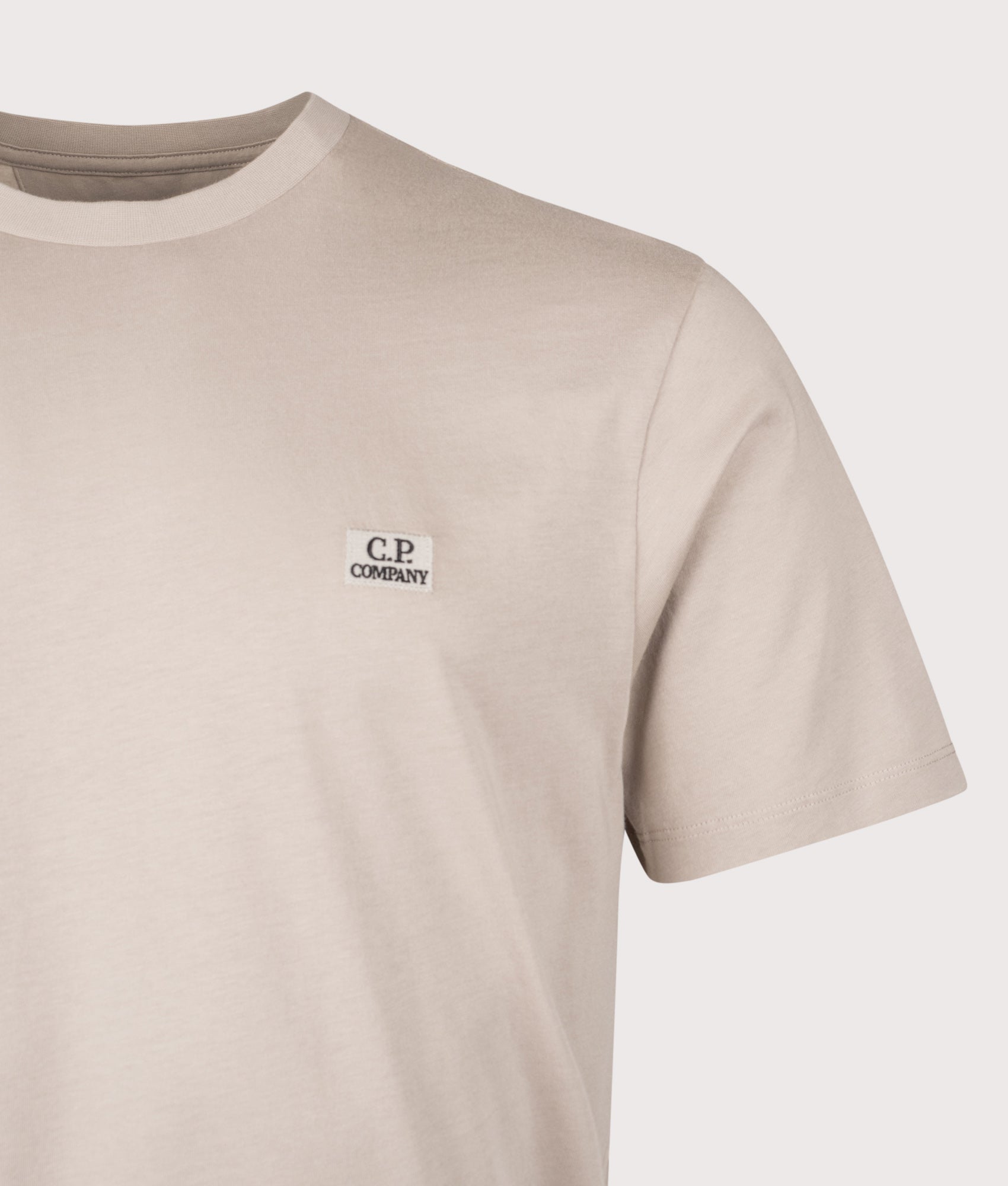 C.P. Company 30/1 Jersey Short Sleeve Logo Patch T-Shirt in Dove at EQVVS Menswear. Detail shot.