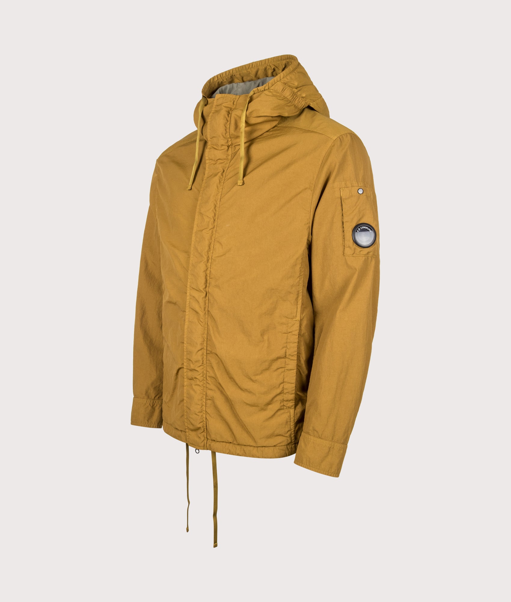 C.P. Company T-ST Nylon Hooded Lens Overshirt in Buck Thorn Brown at EQVVS Menswear. Angled front shot.