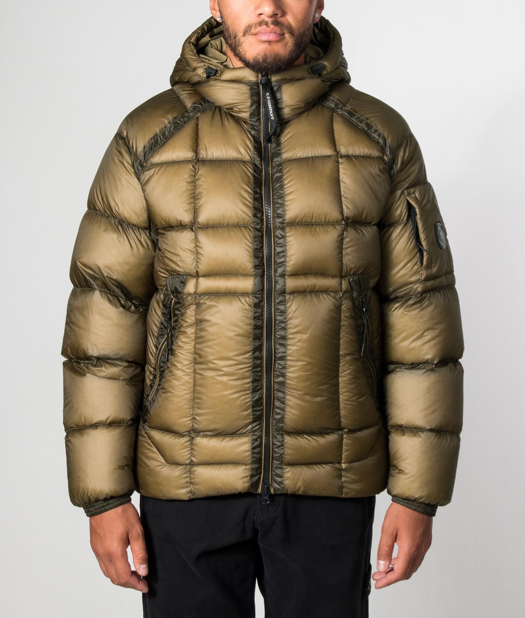 C.P. Company D.D. Shell Hooded Down Jacket in Ermine at EQVVS Menswear. Model front shot.