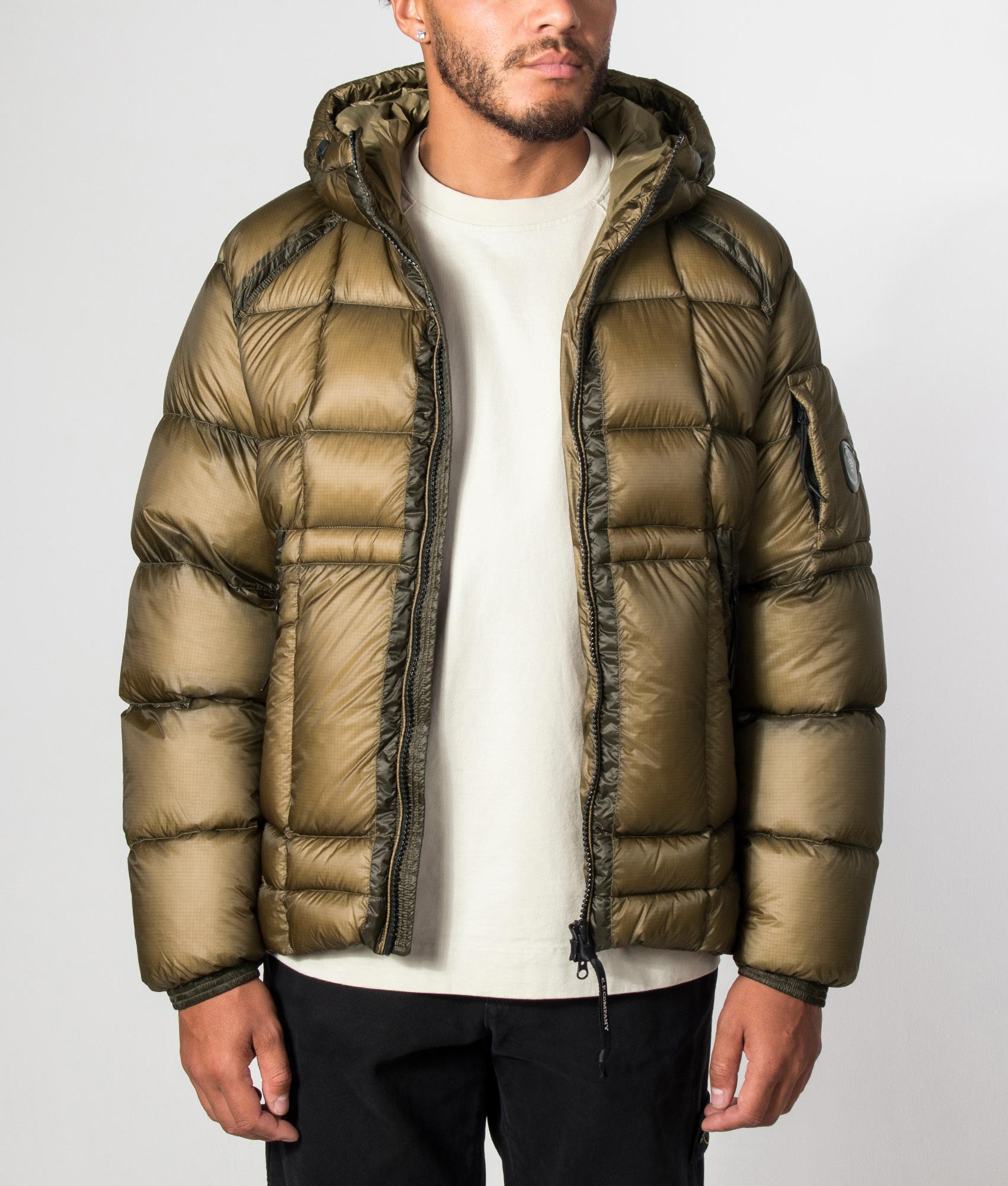 C.P. Company D.D. Shell Hooded Down Jacket in Ermine at EQVVS Menswear. Model open jack shot.