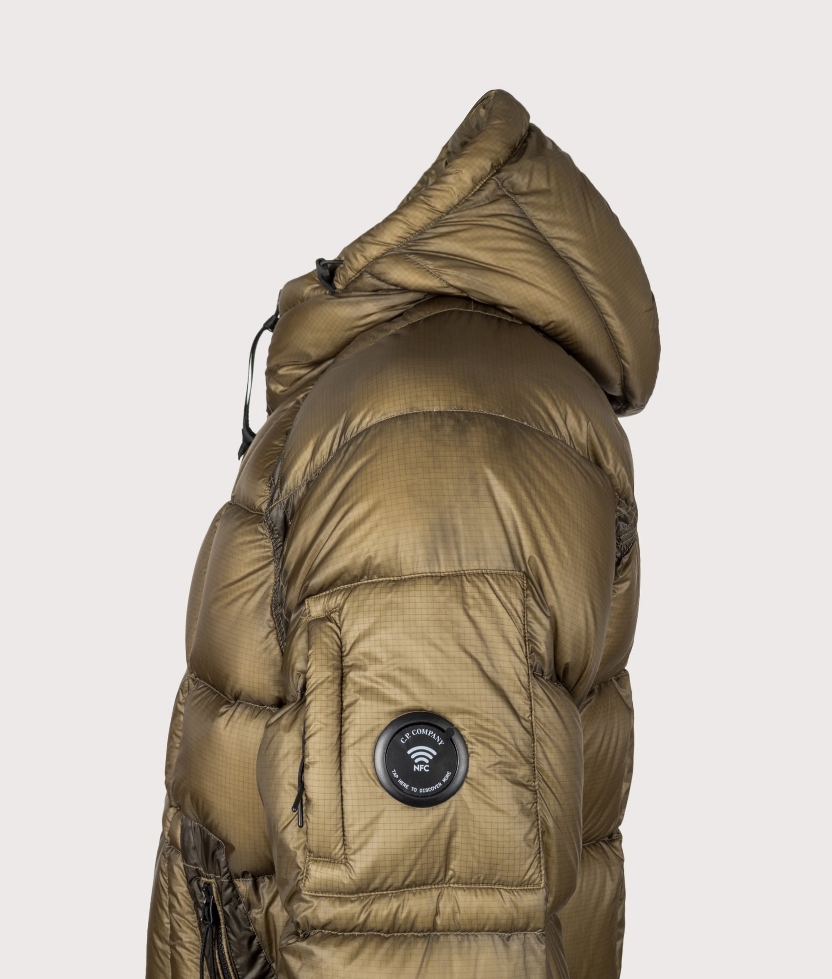 C.P. Company D.D. Shell Hooded Down Jacket in Ermine at EQVVS Menswear. NFC Detail shot.