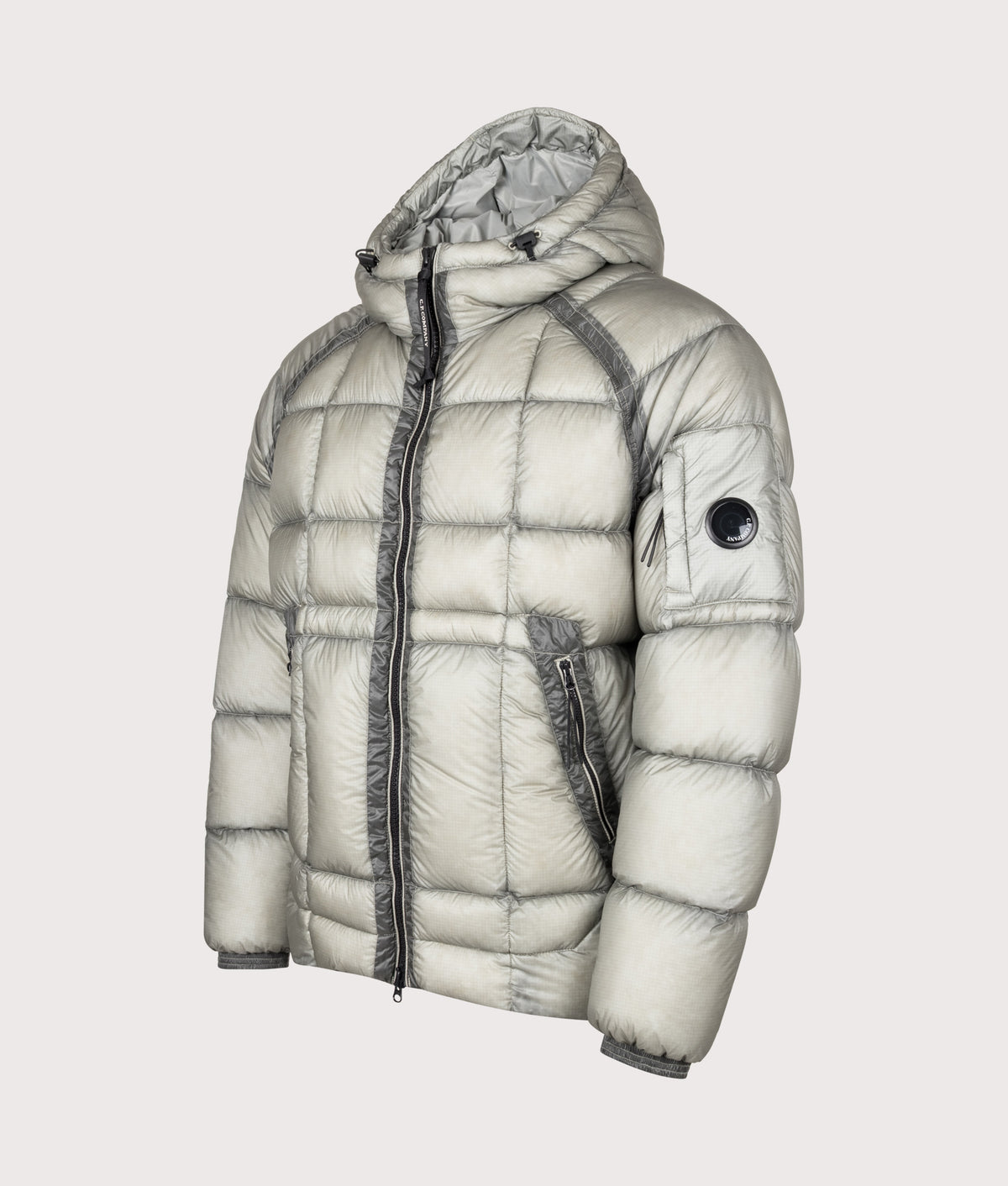 C.P. Company D.D. Shell Hooded Down Jacket in Flint Grey at EQVVS Menswear. Angled front shot.