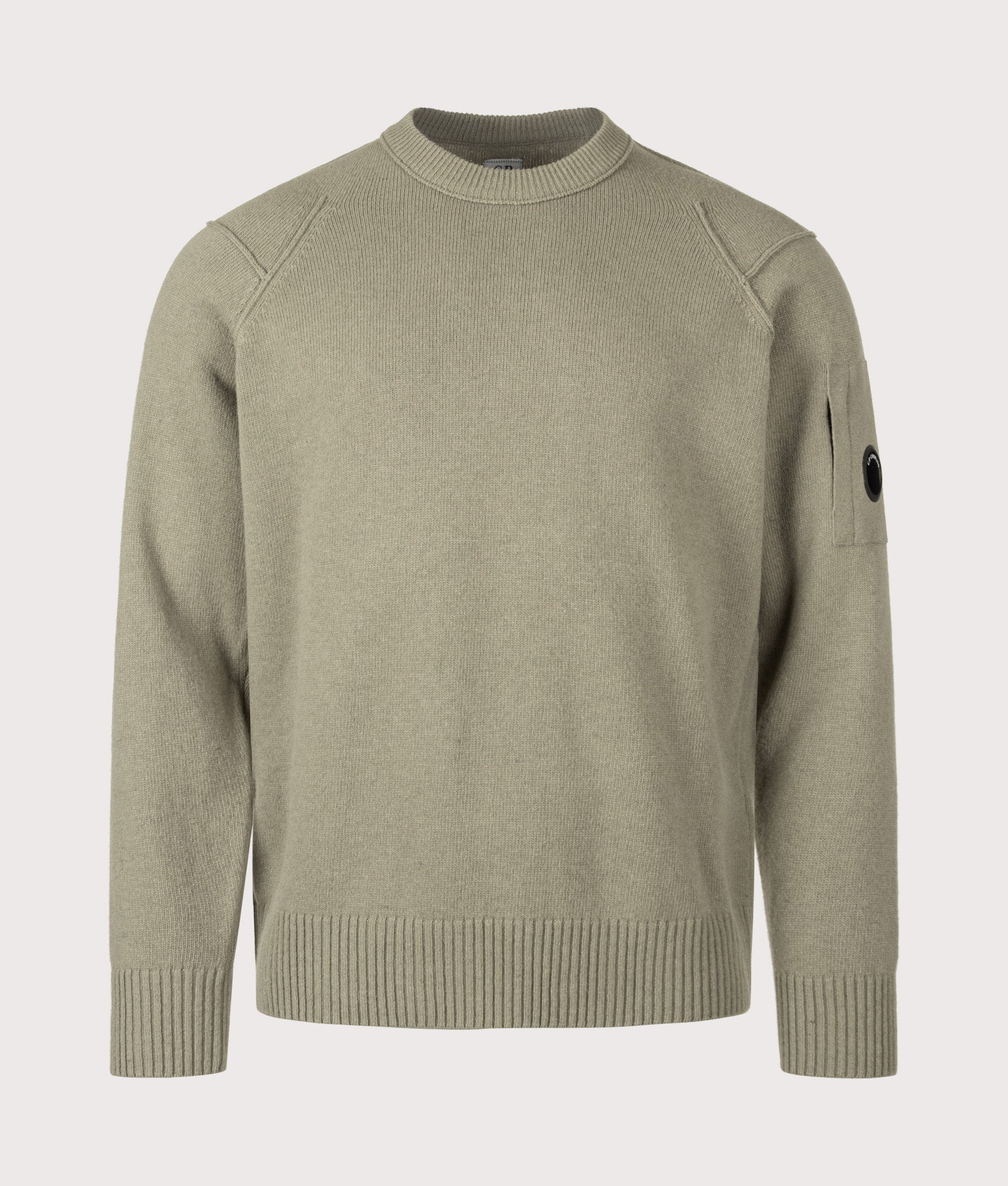 C.P. Company Lambswool GRS Crewneck Lens Jumper in Fallen Rock at EQVVS Menswear. Front shot.