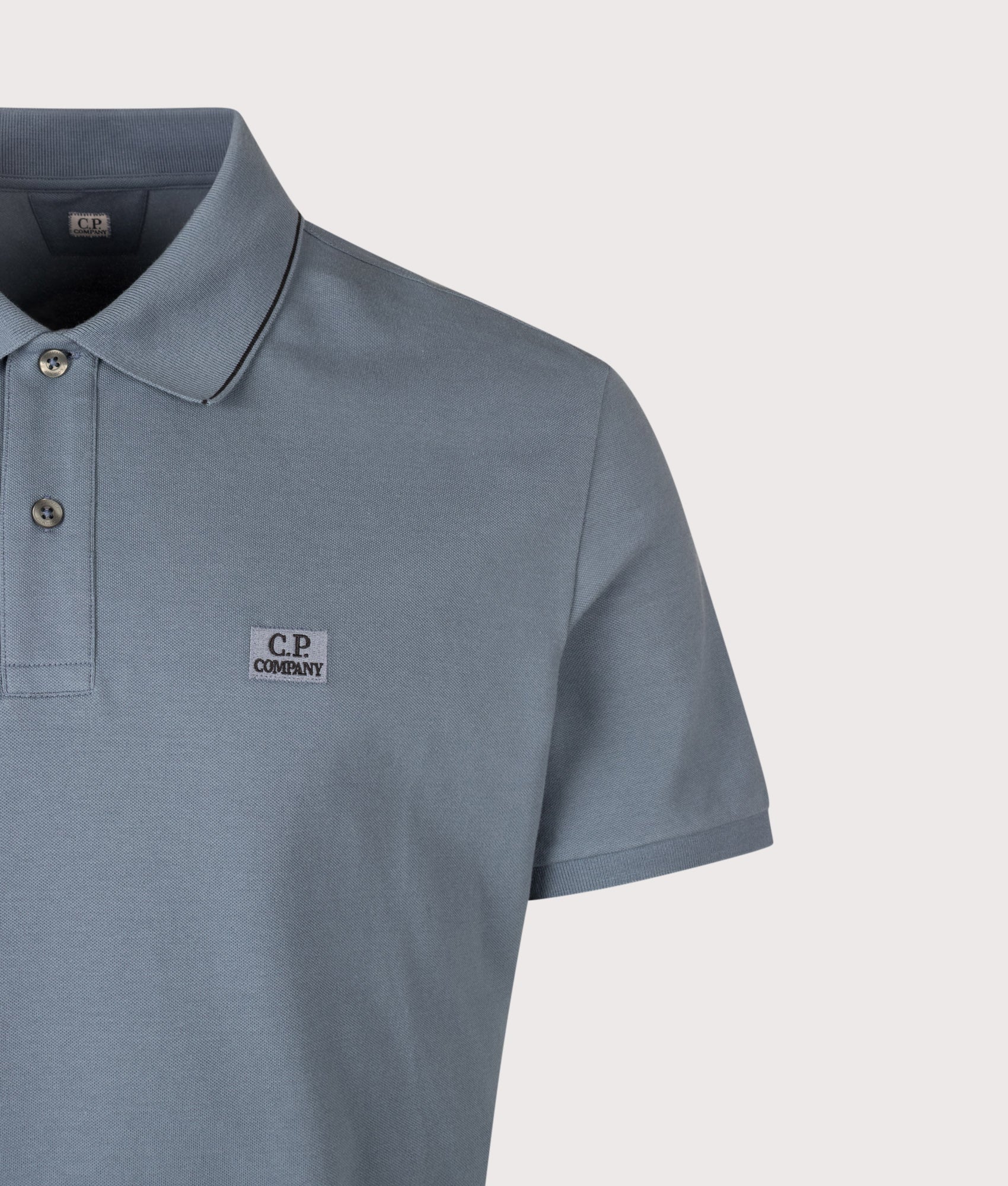 C.P. Company Regular Fit Stretch Piquet Striped Collar Polo Shirt in Orion Blue at EQVVS Menswear. Detail shot.