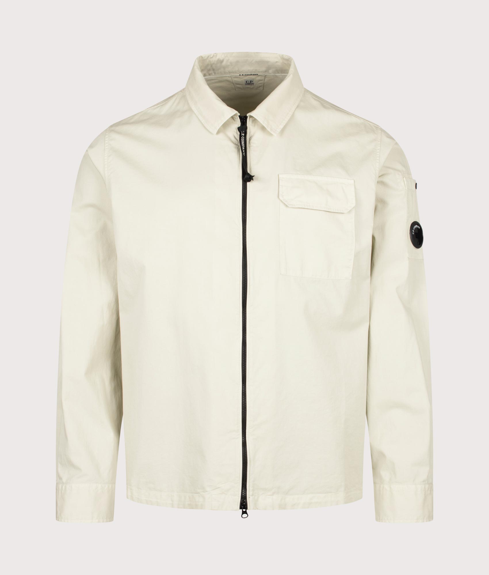 C.P. Company Organic Gabardine Zipped Lens Overshirt in Silver Birch at EQVVS Menswear. Front shot.