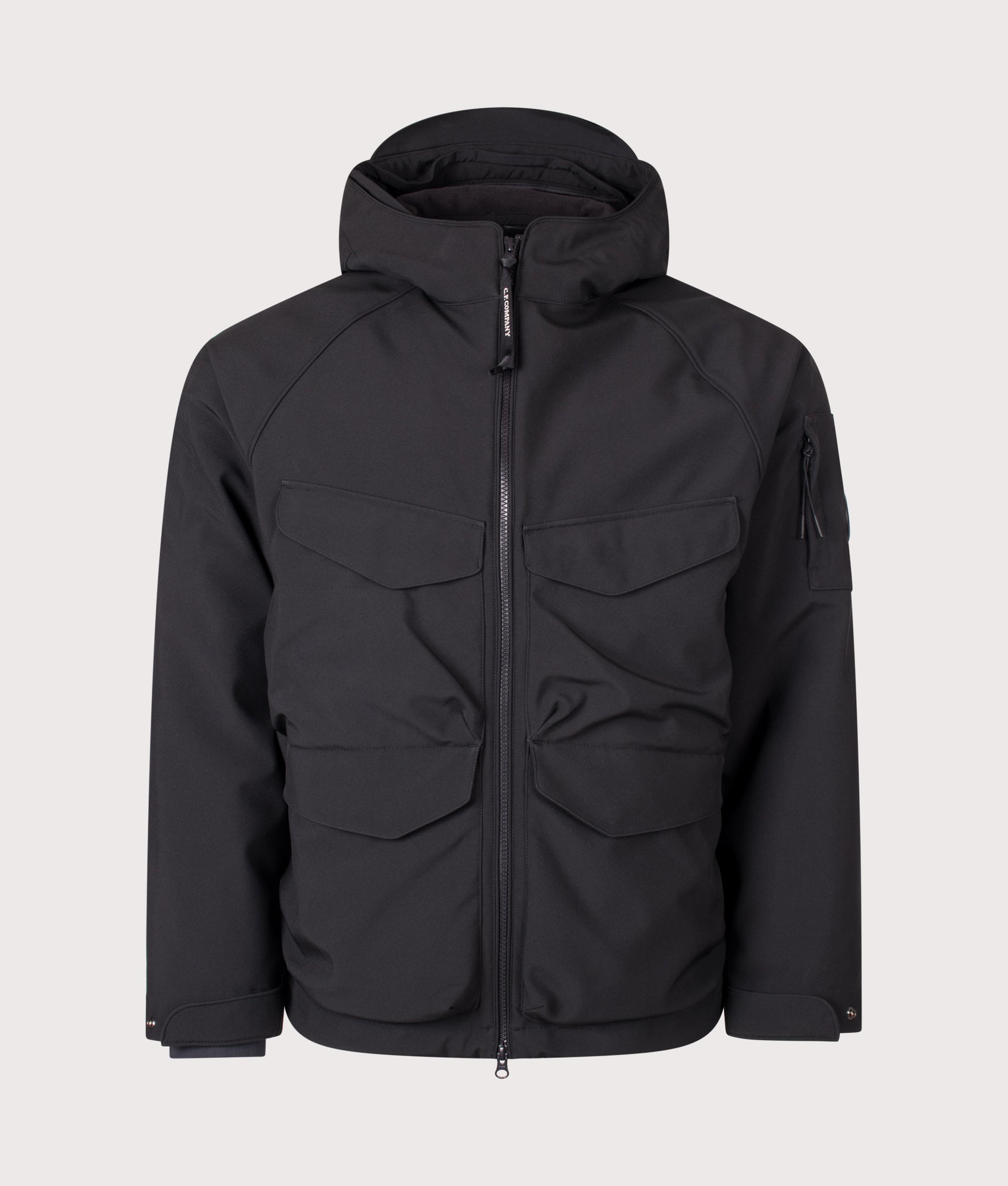 C.P. Company C.P. Shell-R Padded Hooded Lens Jacket in Black at EQVVS Menswear. Jacket front shot.