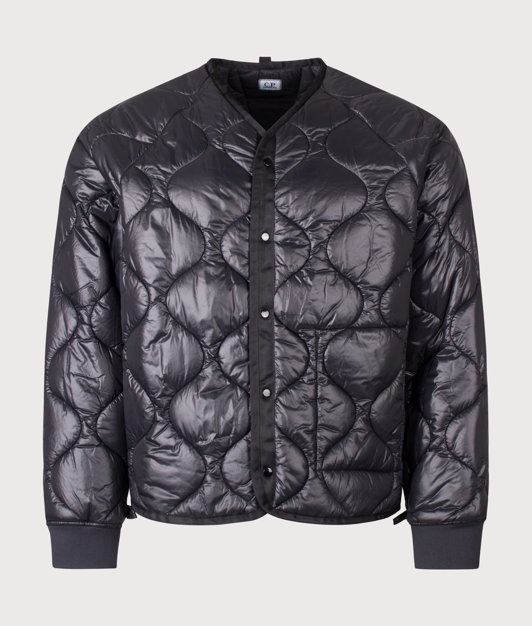 C.P. Company C.P. Shell-R Padded Hooded Lens Jacket in Black at EQVVS Menswear. Liner shot.