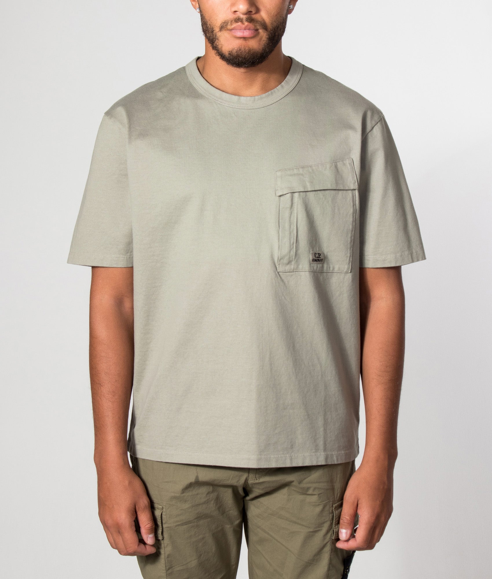C.P. Company 30/2 Mercerized Jersey Twisted Pocket T-Shirt in Fallen Rock at EQVVS Menswear. Model front shot.