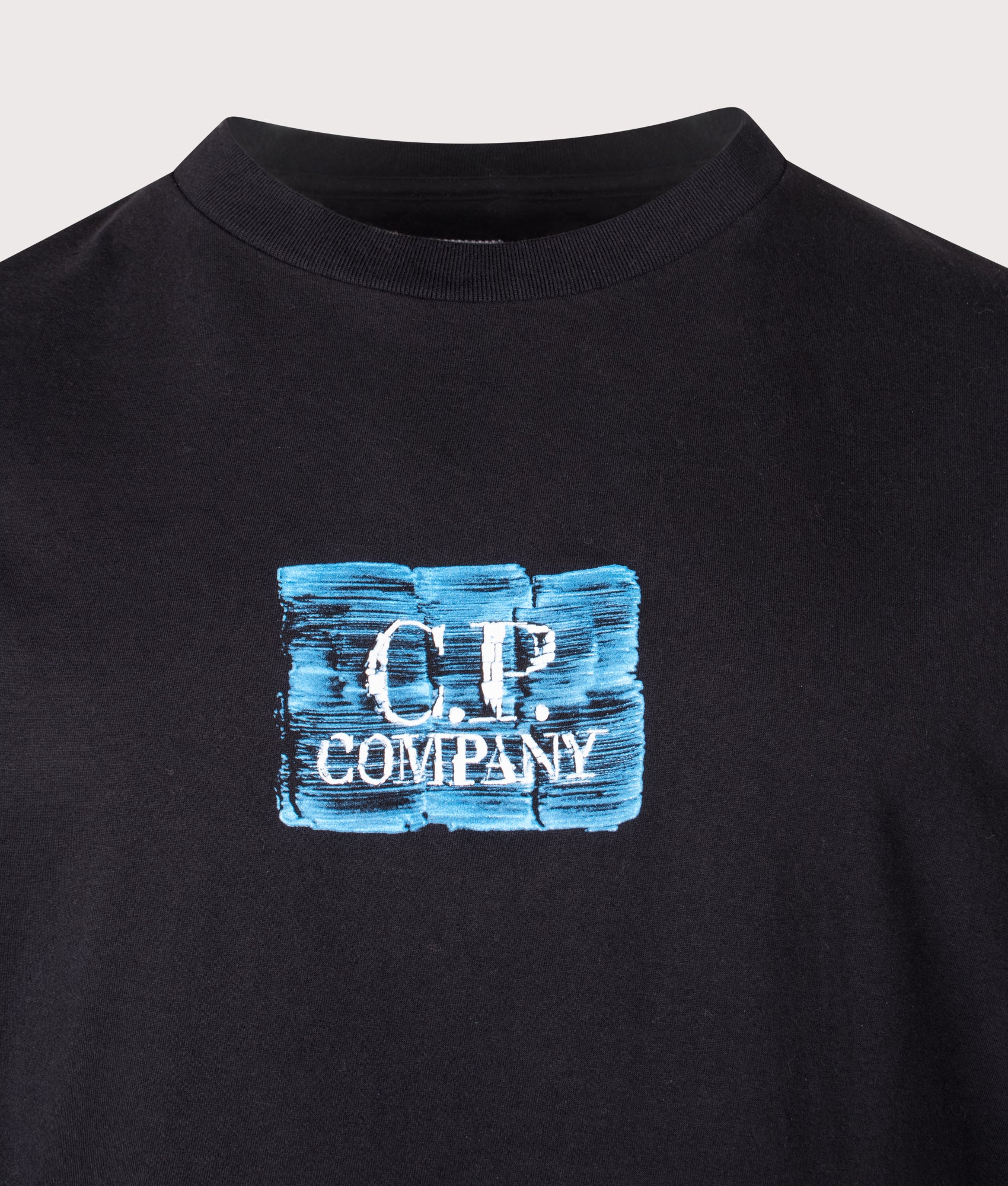 C.P. Company 30/1 Jersey Chest-Back Logo T-Shirt in Black at EQVVS Menswear. Detail shot.