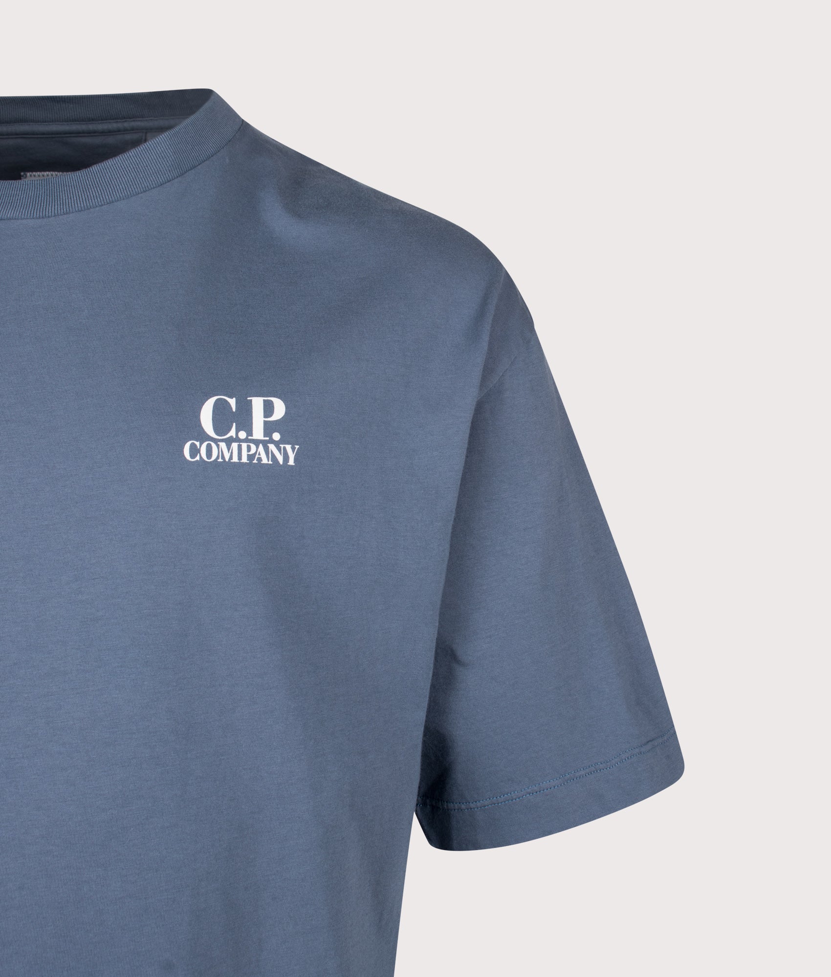 C.P. Company 30/1 Jersey British Sailor T-Shirt in Orion Blue at EQVVS Menswear. Detail shot.