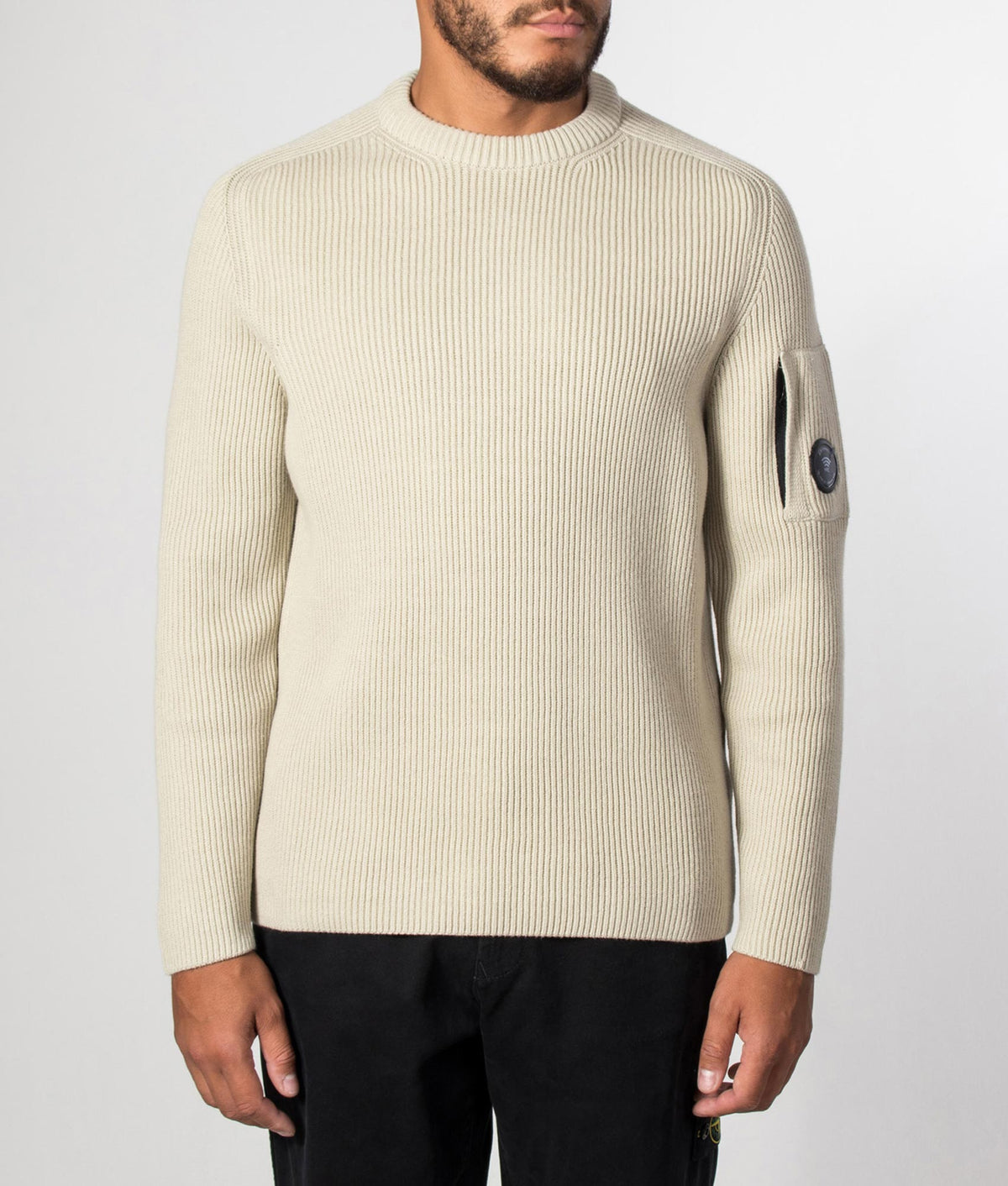 C.P. Company Full Rib Cotton Crewneck Lens Jumper in Silver Birch at EQVVS Menswear. Model front shot.
