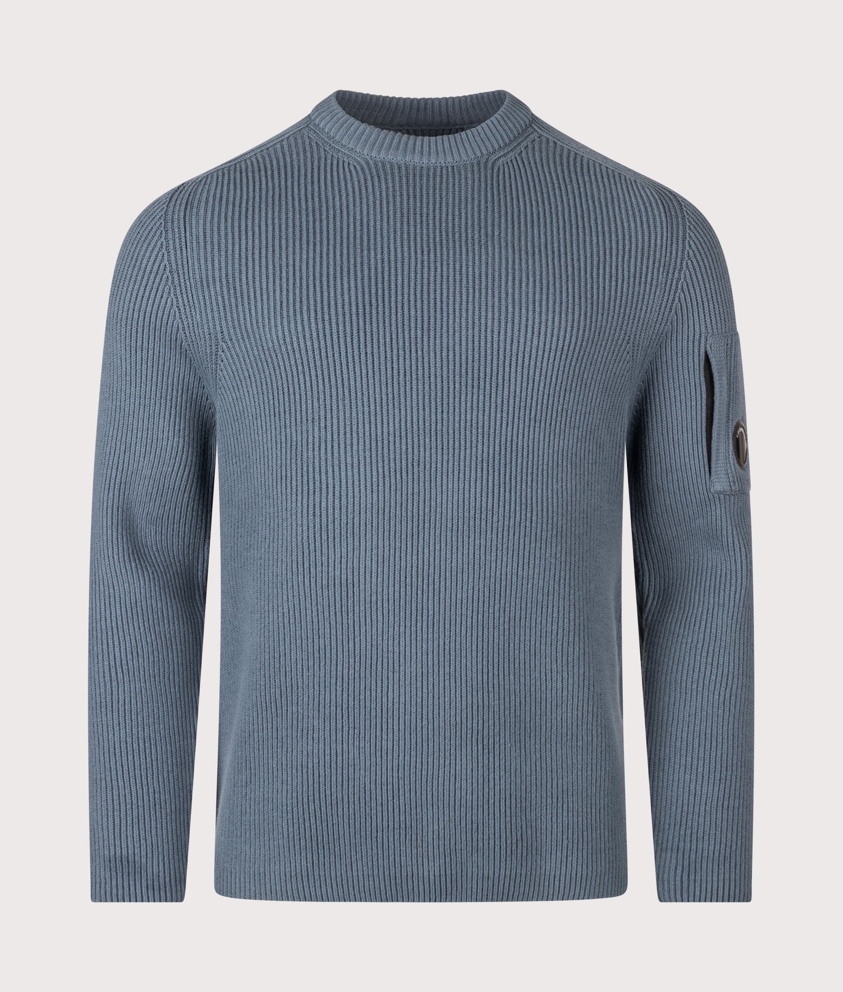 C.P. Company Full Rib Cotton Crewneck Lens Jumper in Orion Blue at EQVVS Menswear. Front shot.