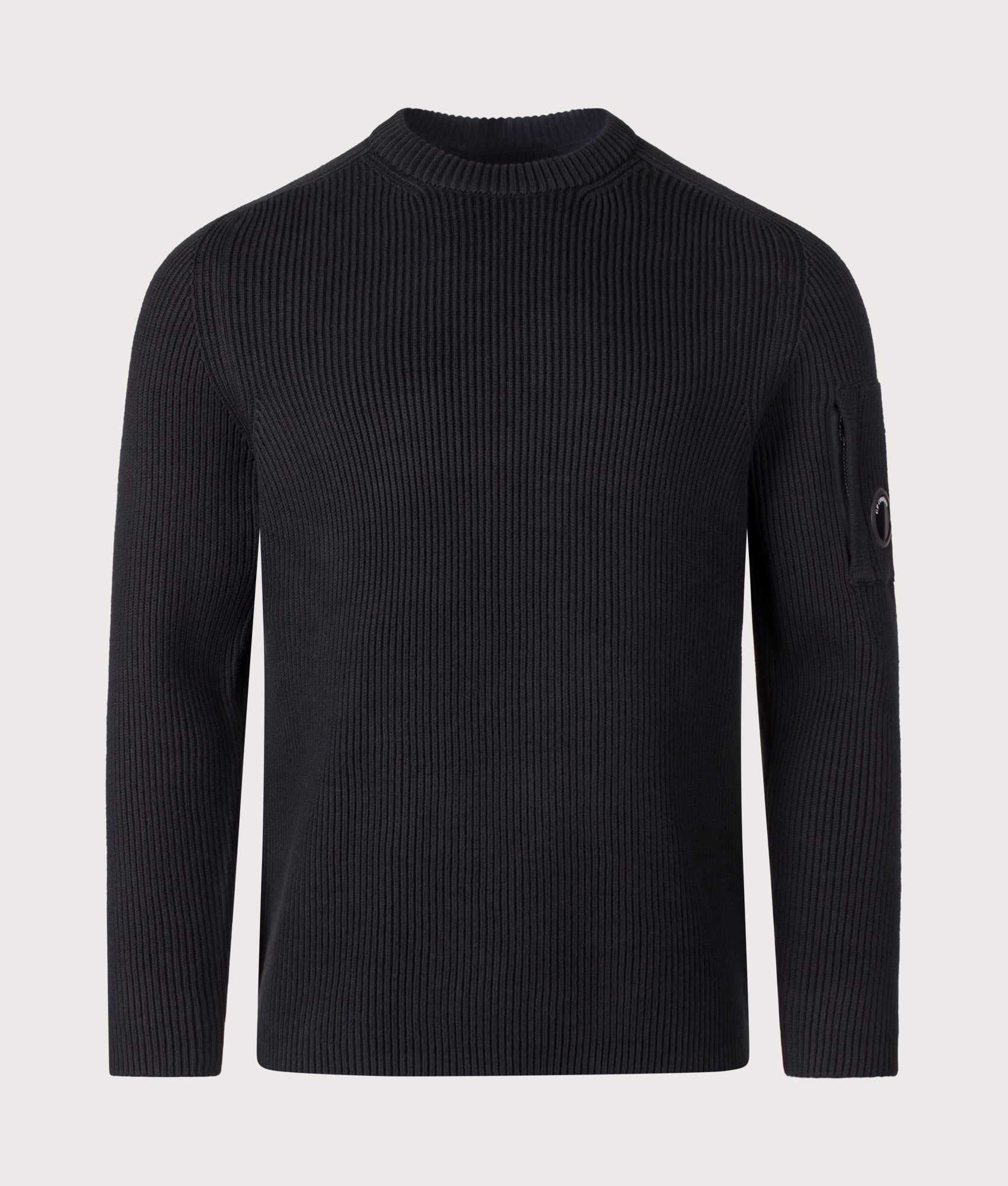 C.P. Company Full Rib Cotton Crewneck Lens Jumper in Black at EQVVS Menswear. Front shot.