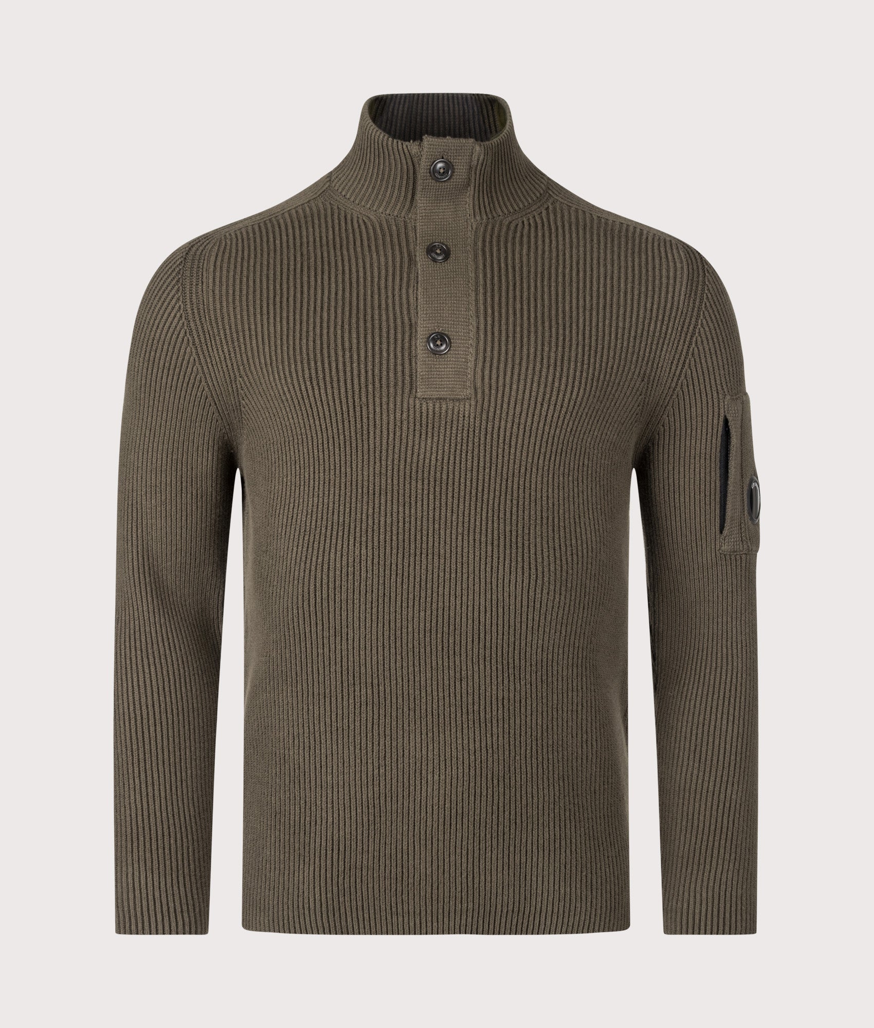 C.P. Company Full Rib Cotton Half Button Lens Jumper in Ivy Green at EQVVS Menswear. Front shot.