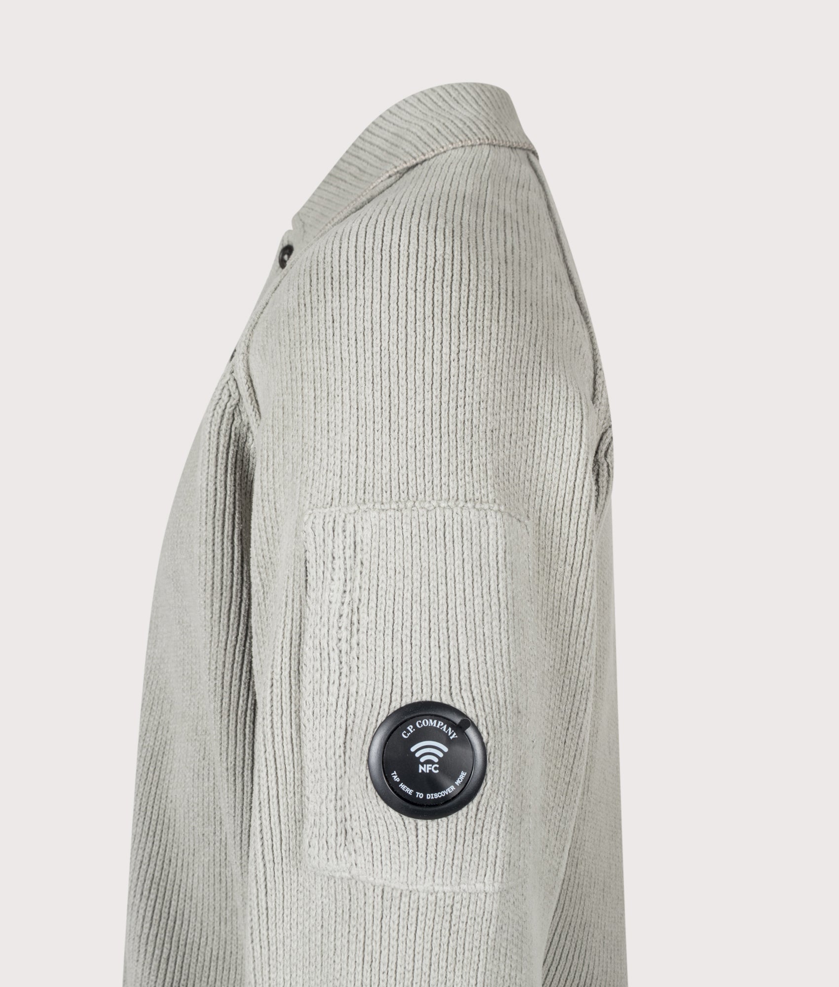 C.P. Company Chenille Cotton Polo Jumper in Flint Grey at EQVVS Menswear. NFC detail shot.