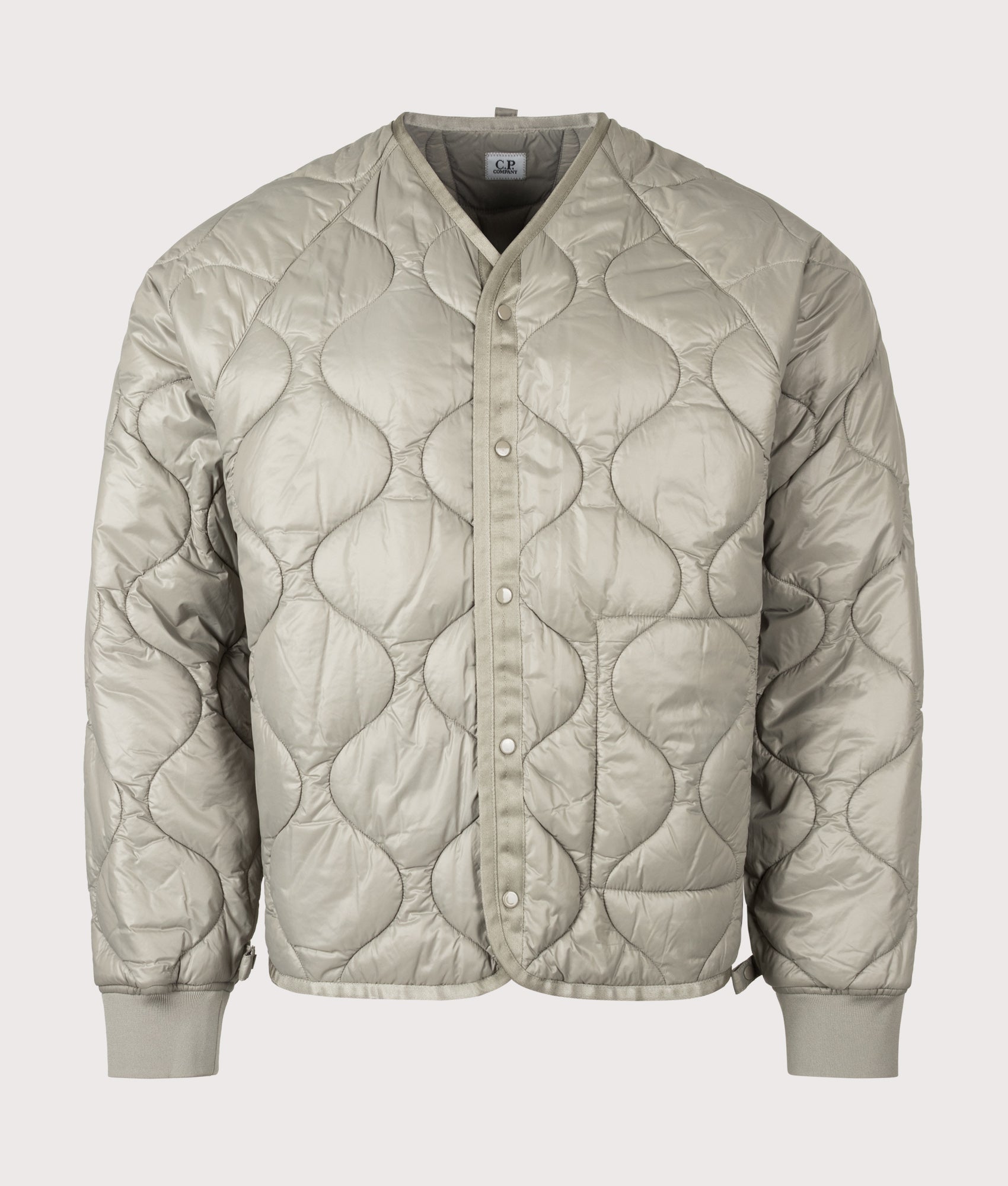 C.P. Company C.P. Shell-R Padded Hooded Lens Jacket in Fallen Rock at EQVVS Menswear. Liners shot.