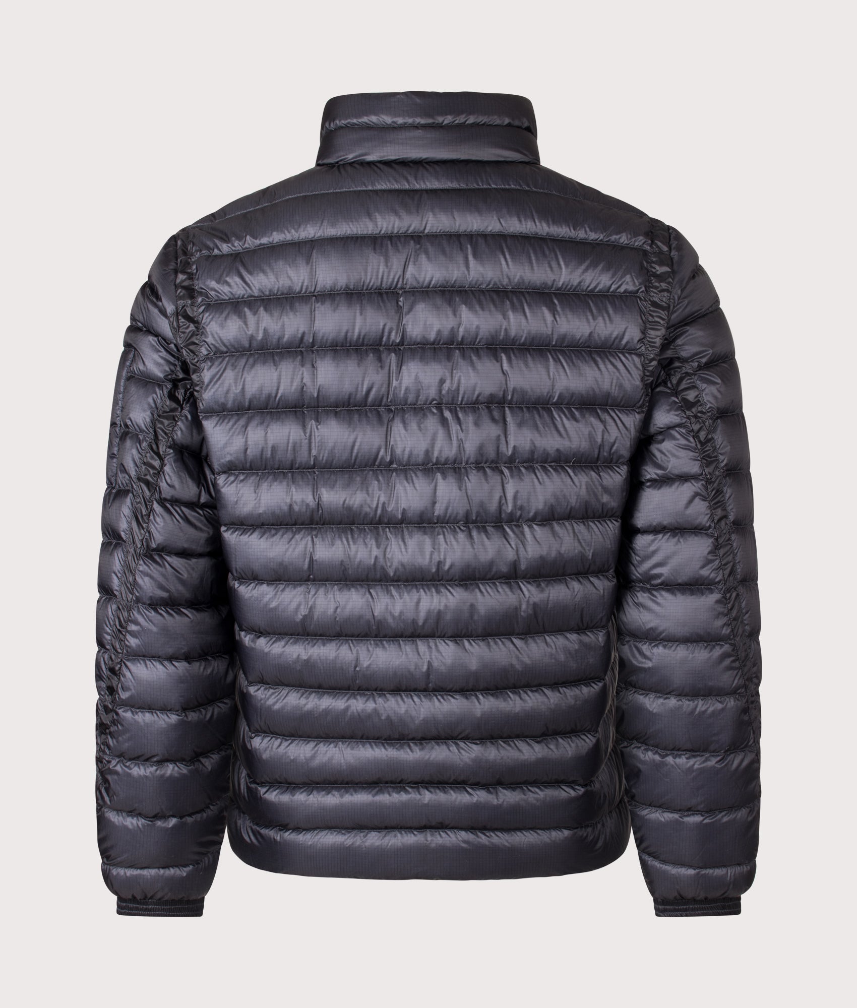 C.P. Company D.D. Shell Lens Down Jacket in Black at EQVVS Menswear. Back shot.