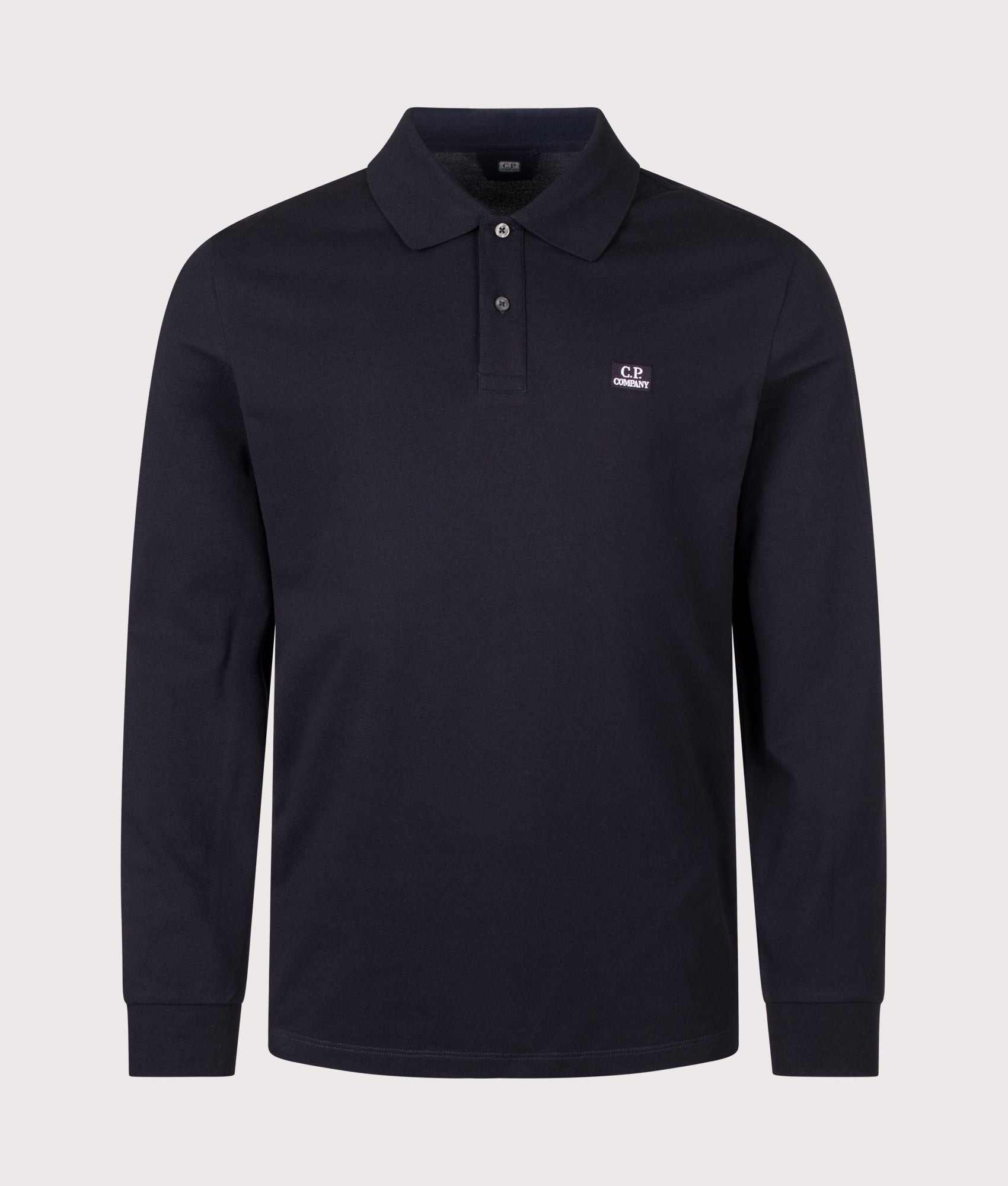 C.P. Company Long Sleeve Stretch Piquet Logo Polo Shirt in Total Eclipse at EQVVS Menswear. Front shot.