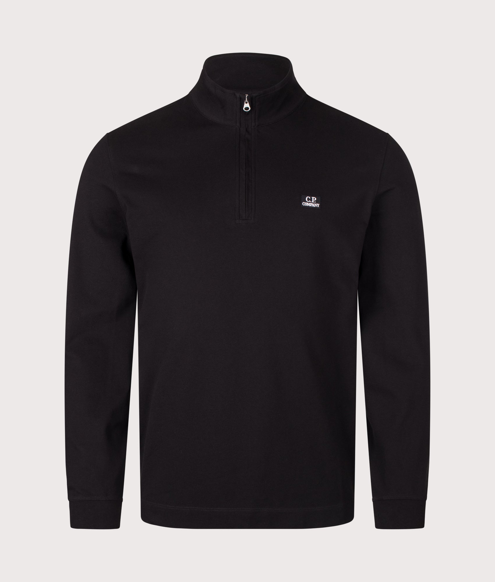 C.P. Company Stretch Piquet Quarter Zip Sweatshirt in Black at EQVVS Menswear. Front shot.