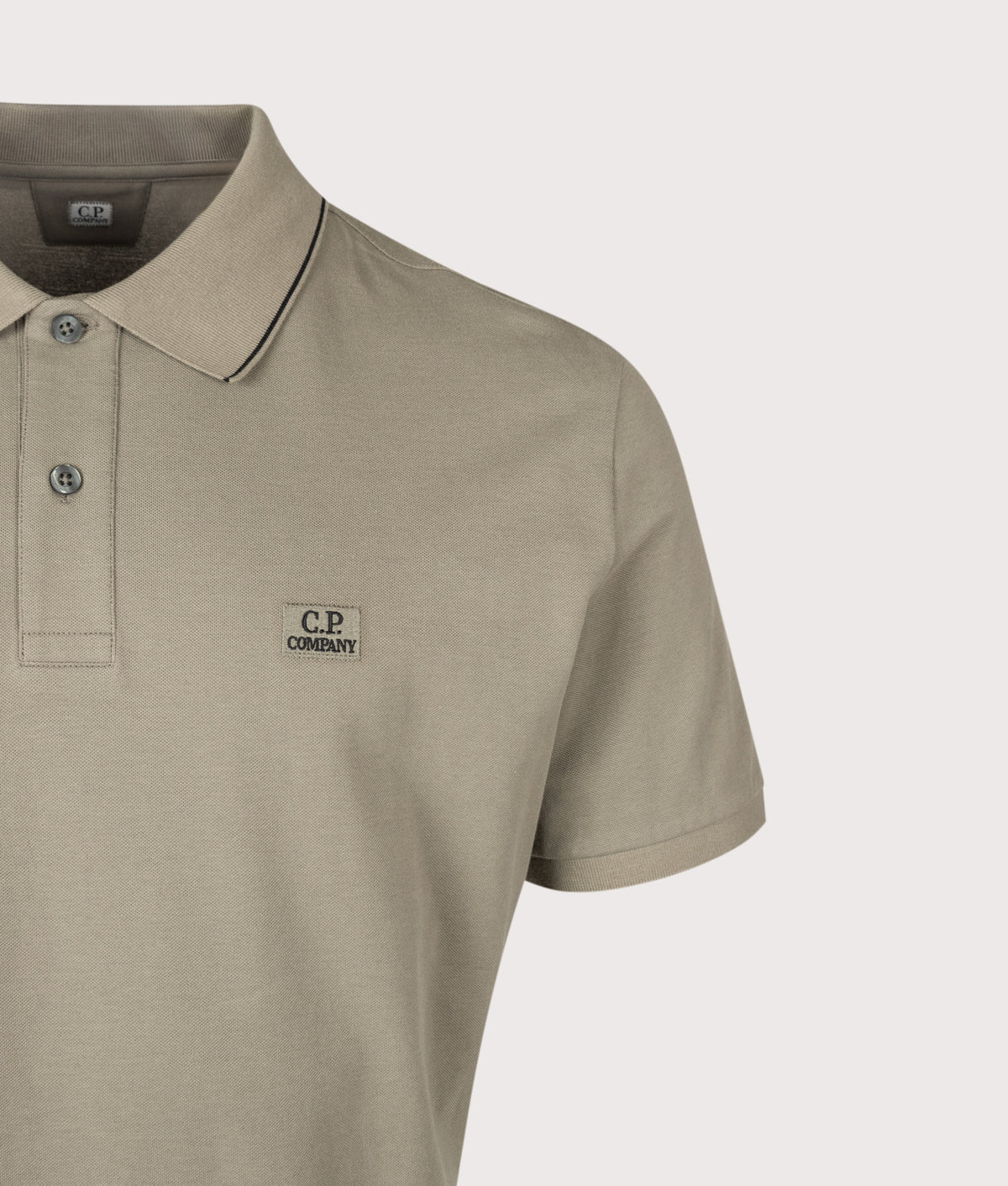 C.P. Company Regular Fit Stretch Piquet Striped Collar Polo Shirt in Fallen Rock at EQVVS Menswear. Detail shot.