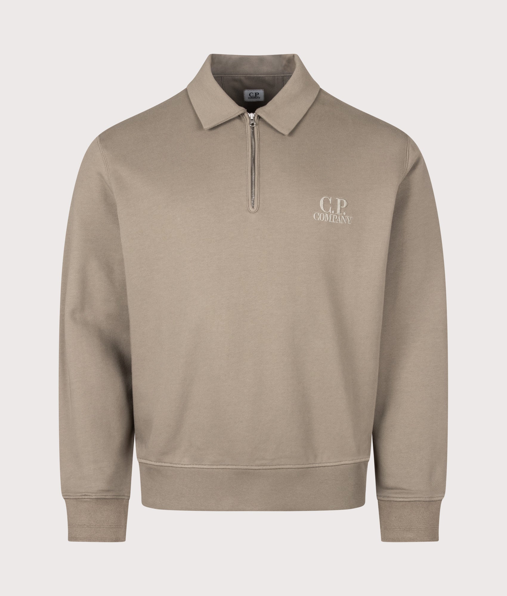 C.P. Company Diagonal Raised Fleece Polo Collar Sweatshirt in Fallen Rock at EQVVS Menswear. Front shot.