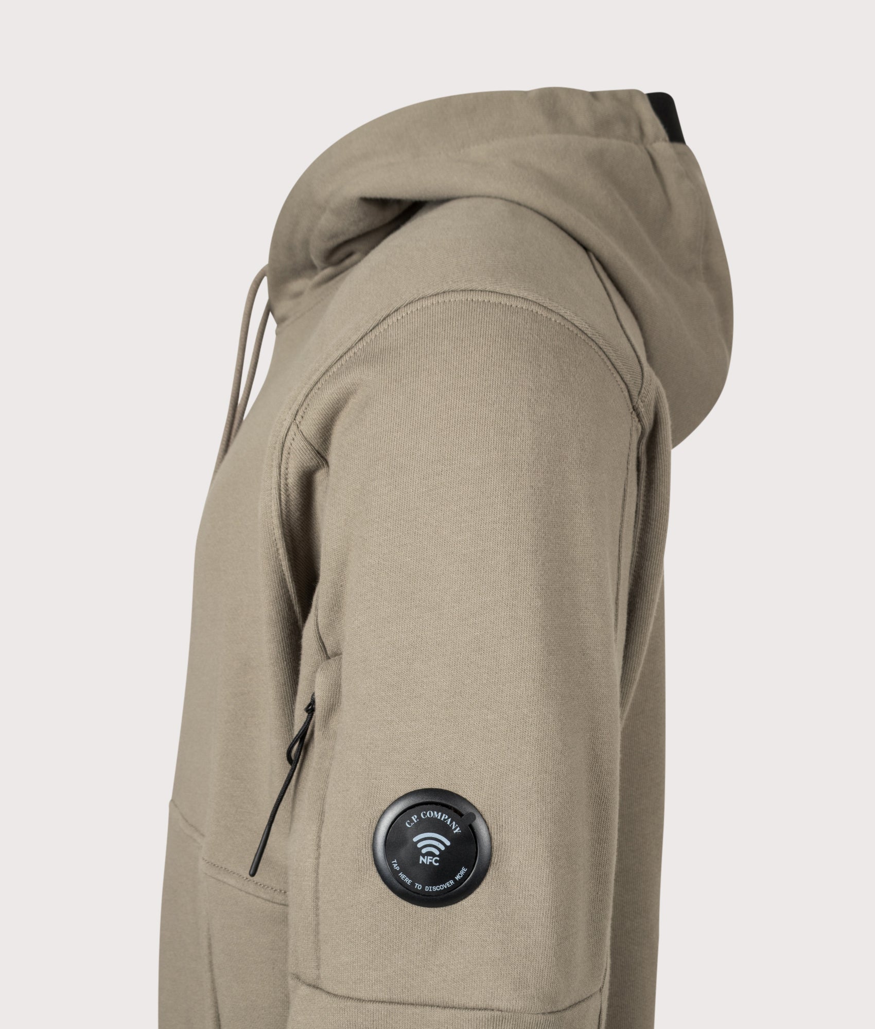 C.P. Company Diagonal Raised Fleece Hoodie in Fallen Rock at EQVVS Menswear. NFC Detail shot.