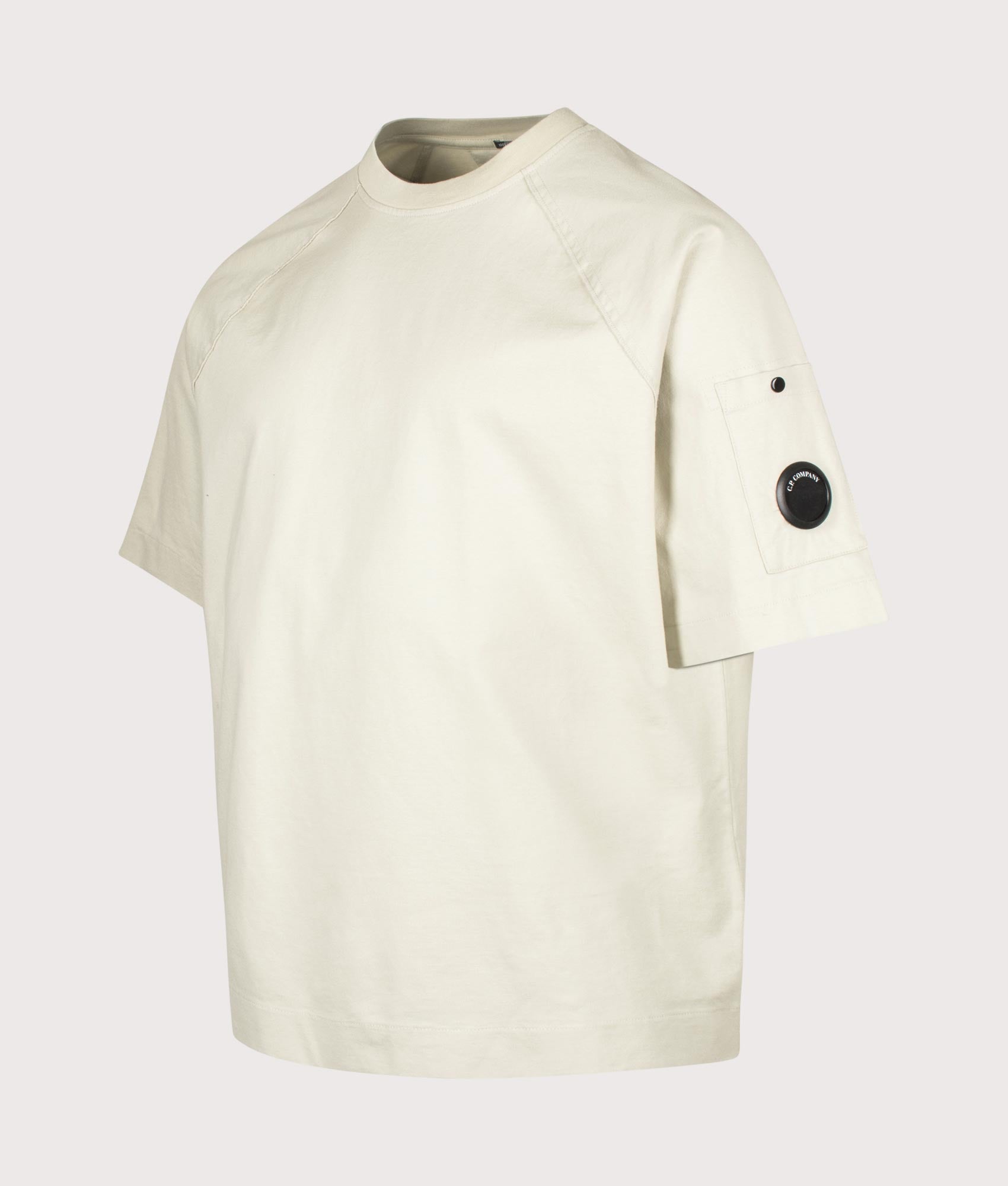 C.P. Company 30/2 Mercerized Jersey Twisted Lens T-Shirt in Silver Birch at EQVVS Menswear. Angled front shot.