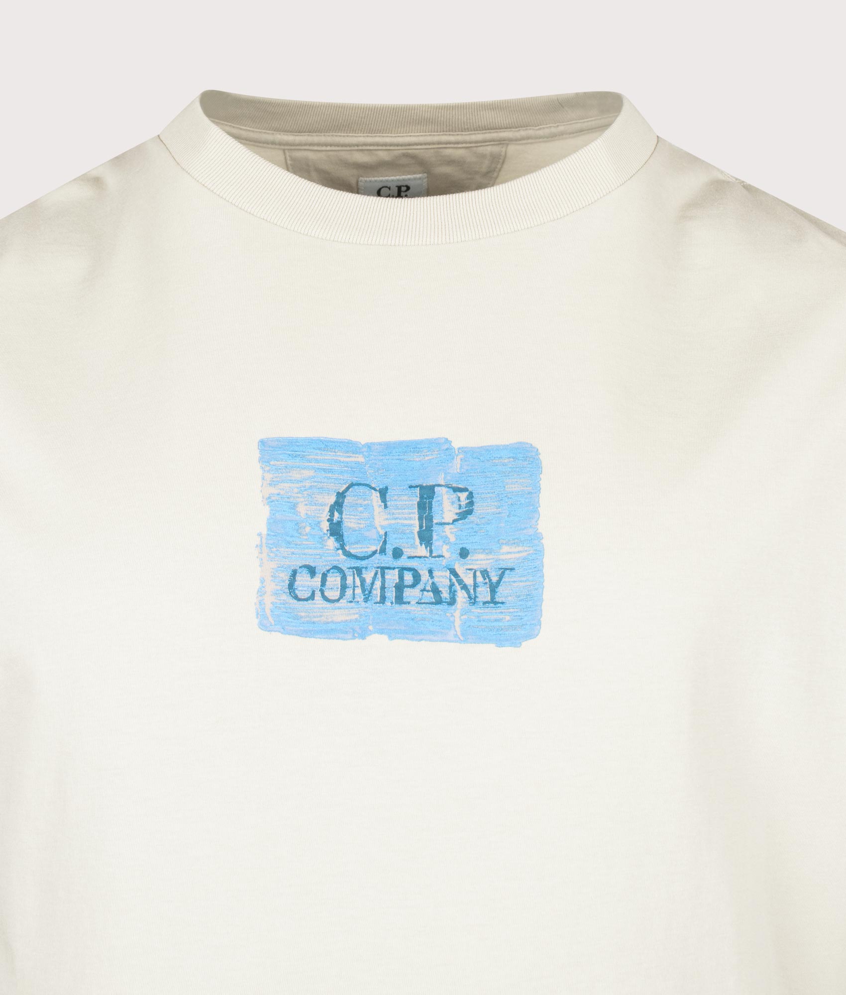 C.P. company 30/1 Jersey Chest-Back Logo T-Shirt in Silver Birch at EQVVS Menswear. Detail shot.