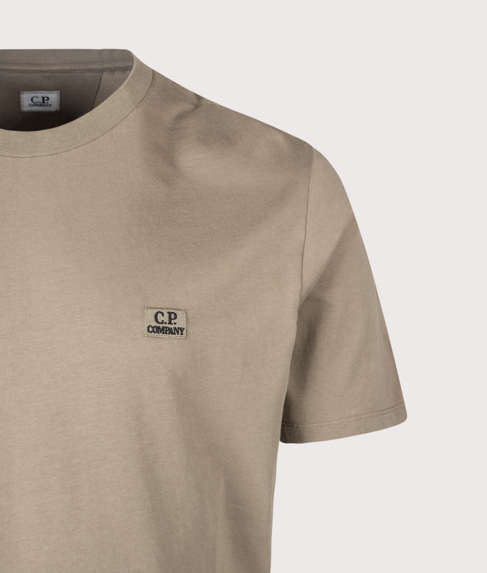 C.P. Company 30/1 Jersey Logo Patch T-Shirt in Fallen Rock at EQVVS Menswear. Detail shot.