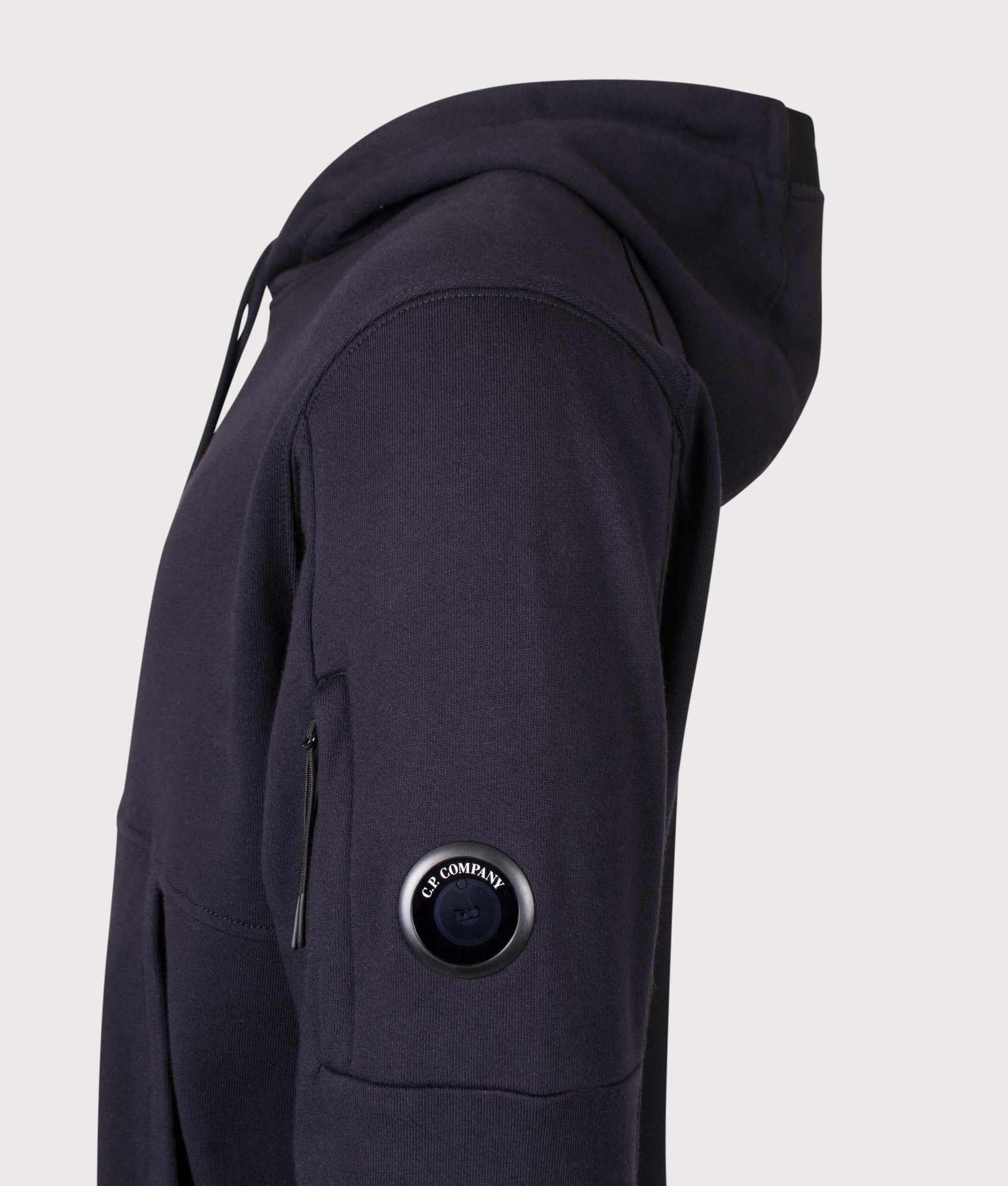 C.P. Company Diagonal Raised Fleece Hoodie in Total Eclipse at EQVVS Menswear. Detail shot.