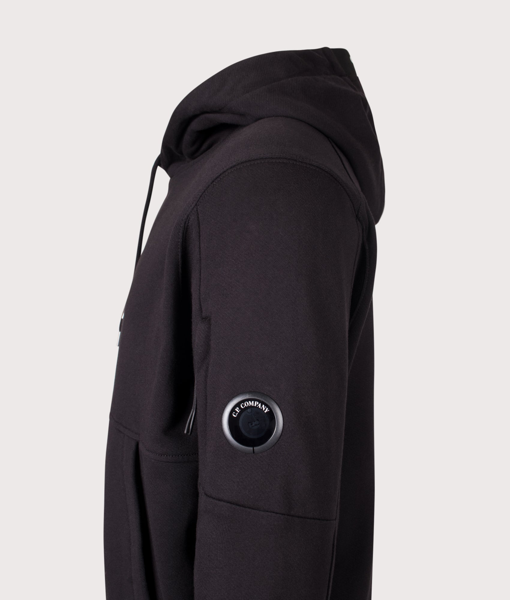 C.P. Company Diagonal Raised Fleece Hoodie in Black at EQVVS Menswear. Detail shot.