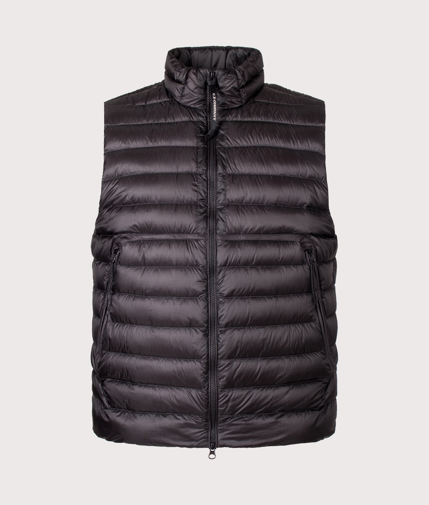 C.P. Company Dd-Shell Down Lens Gilet in Black at EQVVS Menswear. Front shot.