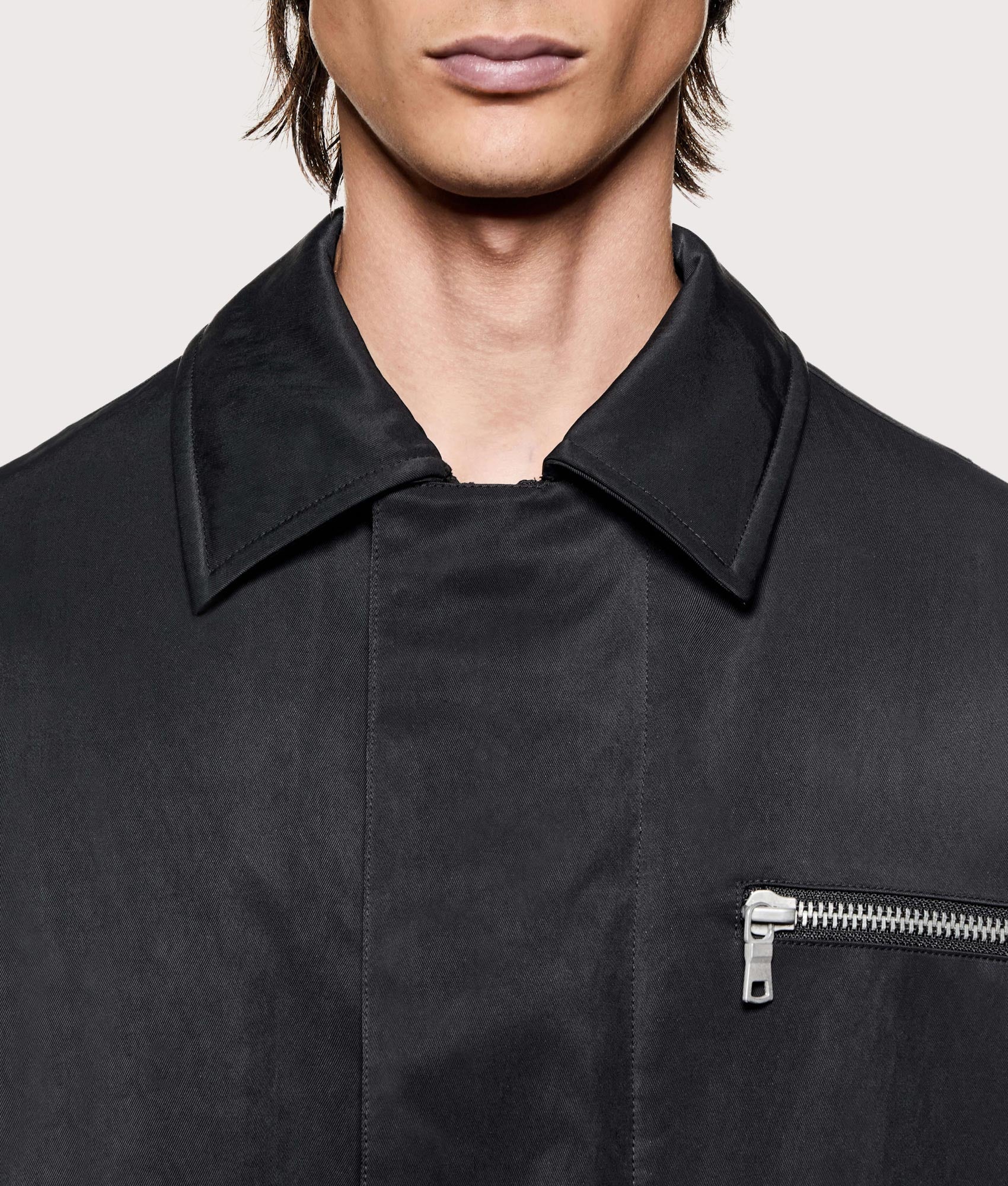 MKI MIYUKI ZOKU Padded Nylon Box Jacket in Black at EQVVS Menswear. Secondary detail shot.