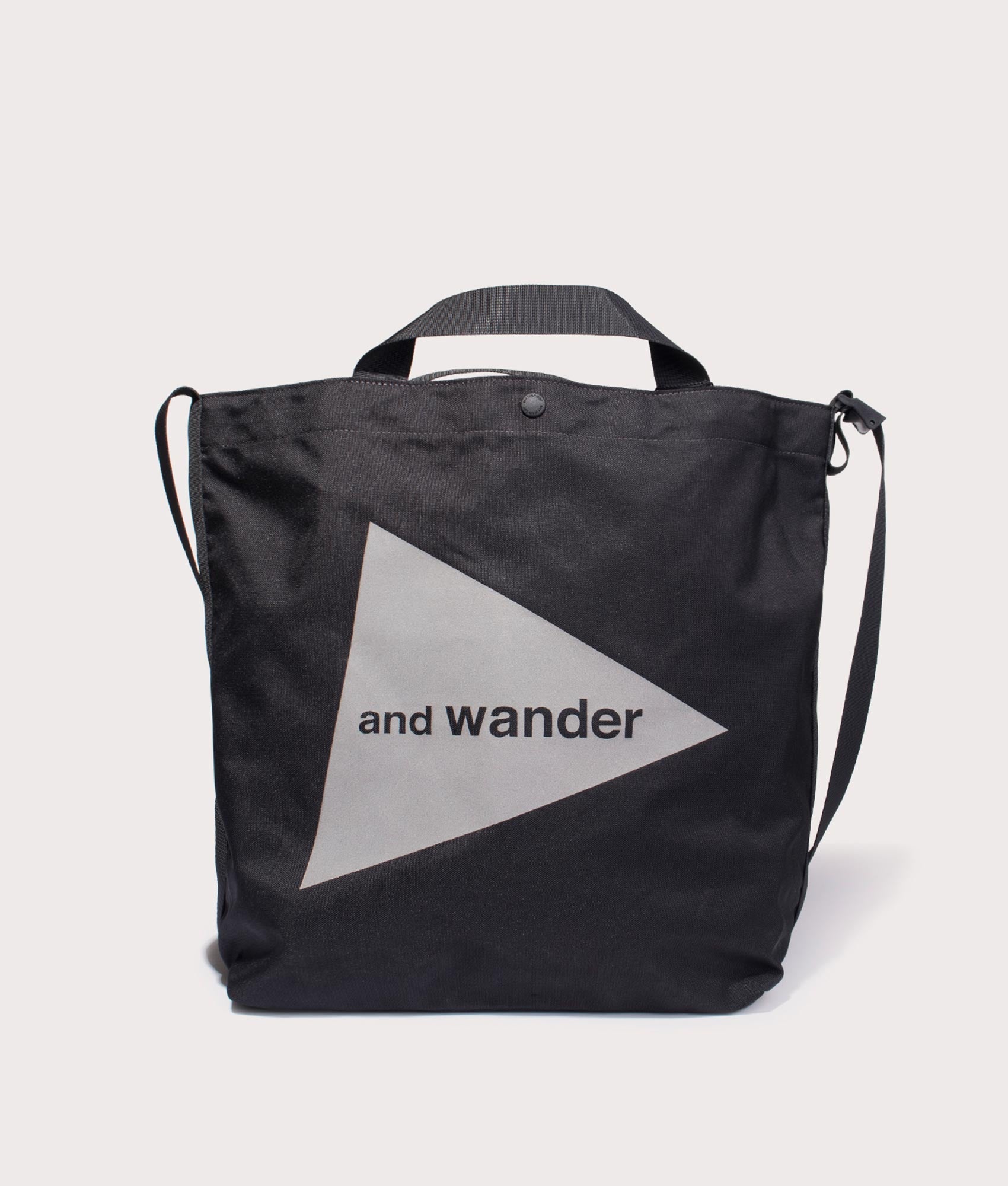 and wander Recycled OX Logo Tote Bag  in Black at EQVVS Menswear. Front shot.
