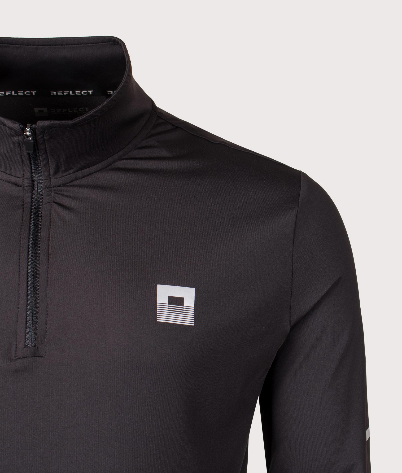 Core ID Quarter Zip Track Top. Shot by EQVVS. Front detail shot.