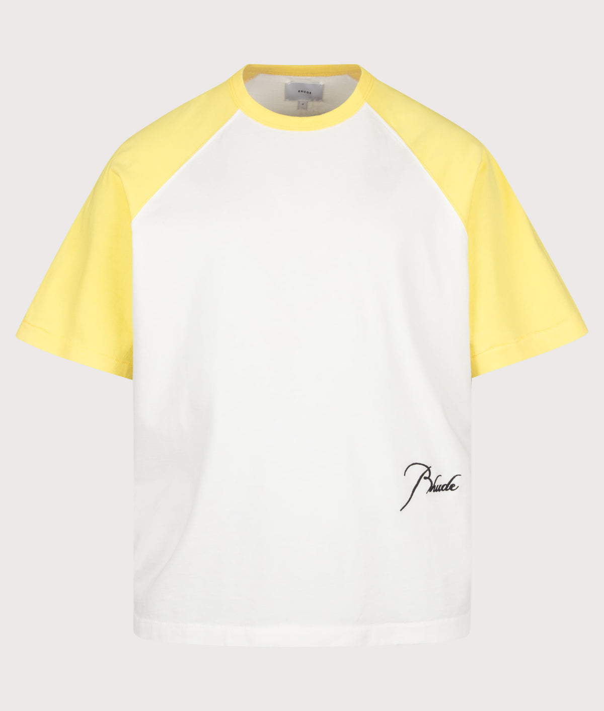 RHUDE Oversized Fit Classique Washed Raglan T-Shirt in Washed Sahara Yellow, White and Black at EQVVS Menswear. Front shot.