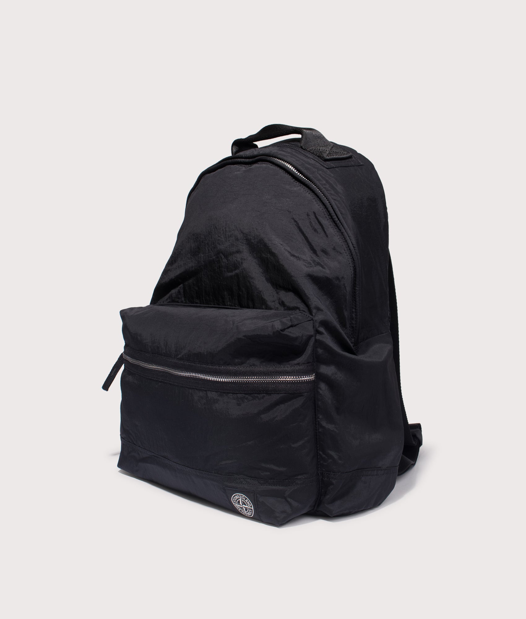Coated Nylon Backpack. Shot by EQVVS. Front angled shot.