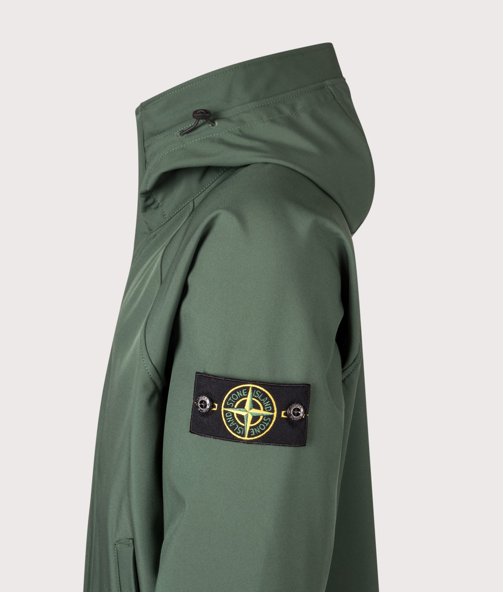 Stone Island Short Parka in Juniper at EQVVS Menswear. Side shot.