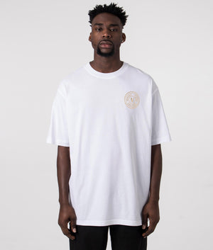Relaxed Fit L V Emblem T Foil T-Shirt in White by Versace Jeans Couture. EQVVS Front Angle Shot.