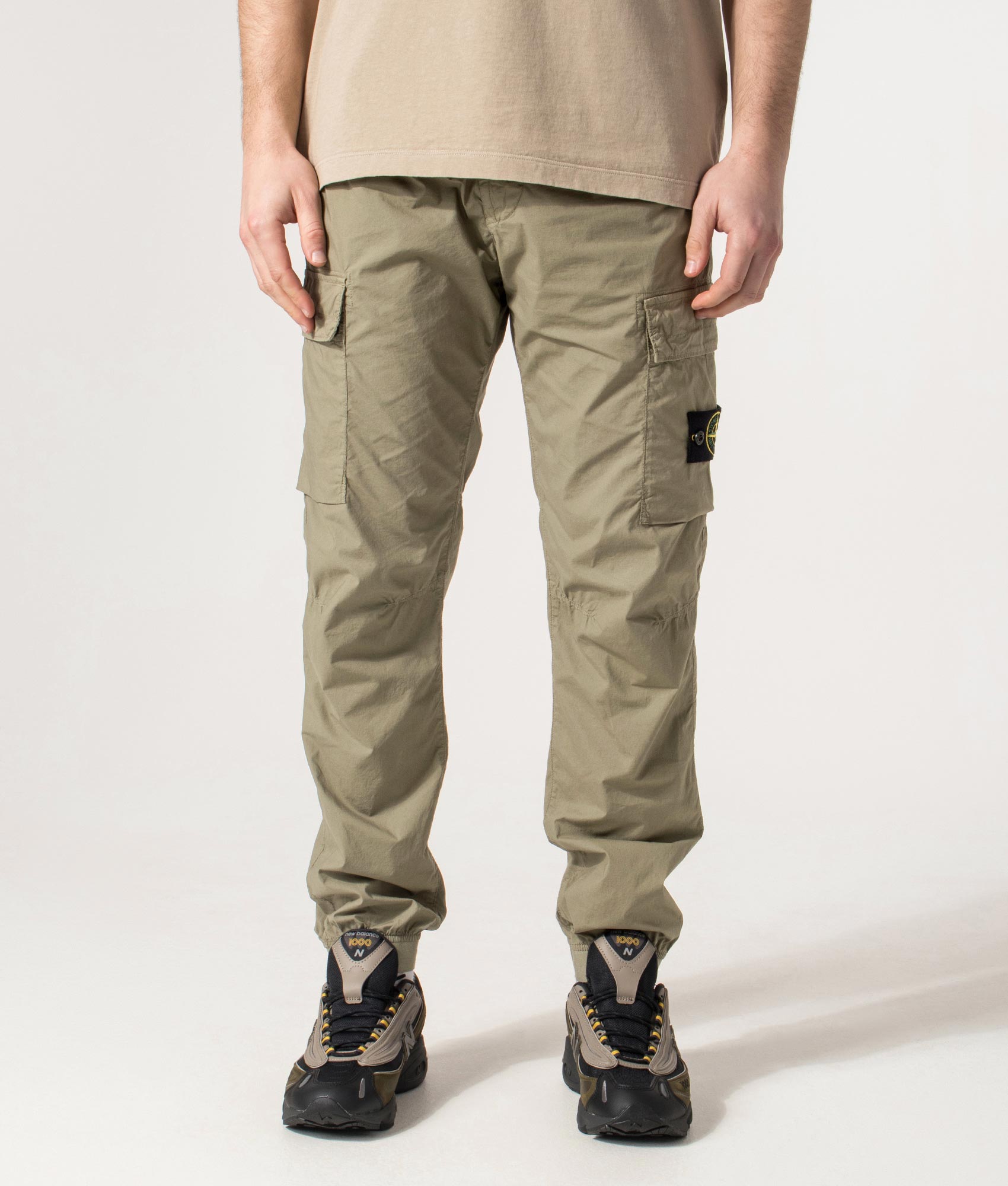 Regular Fit Tapered Cargo Pants in Military Green | Stone Island | EQVVS | Front model shot 