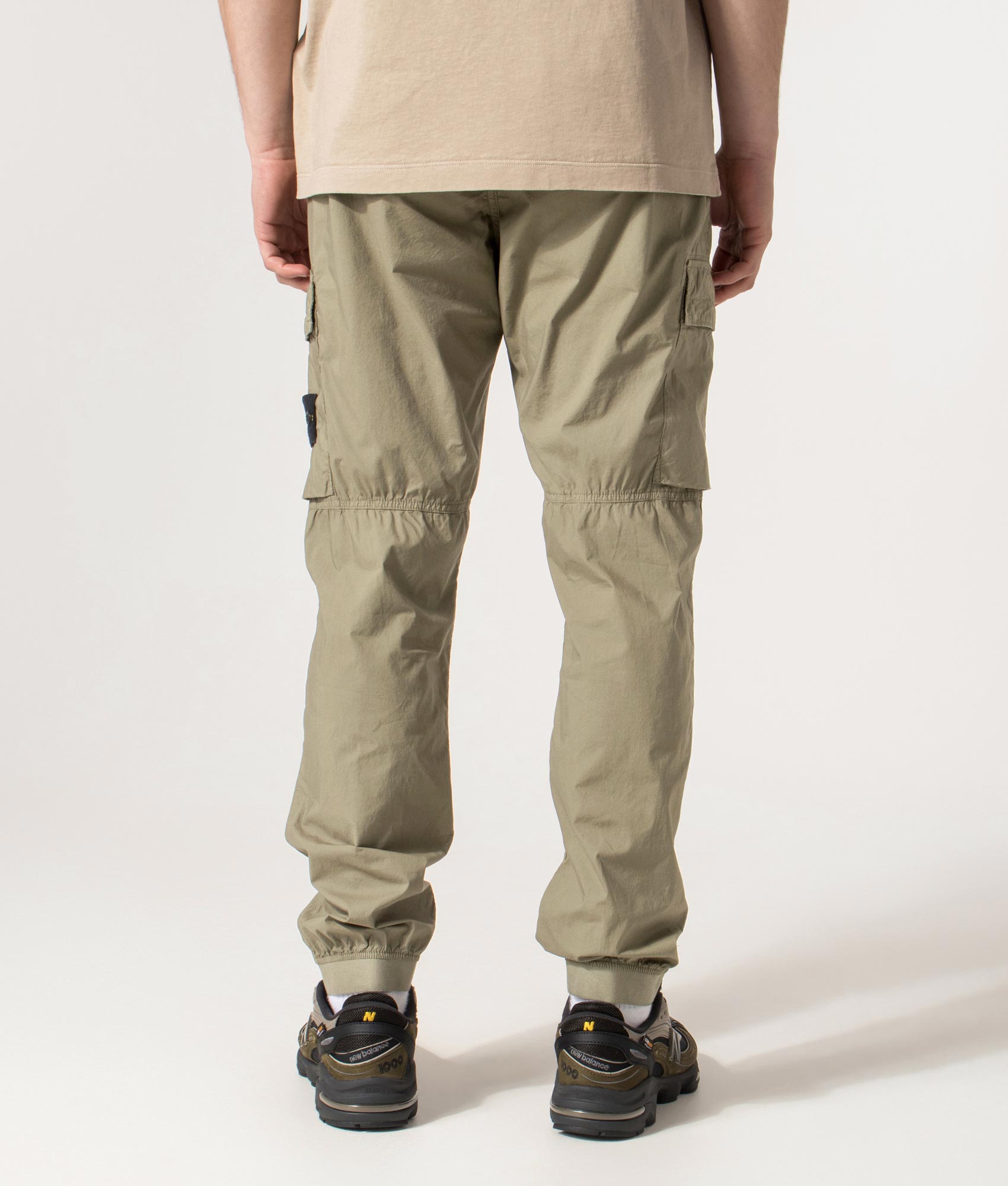 Regular Fit Tapered Cargo Pants in Military Green | Stone Island | EQVVS | Back model shot 