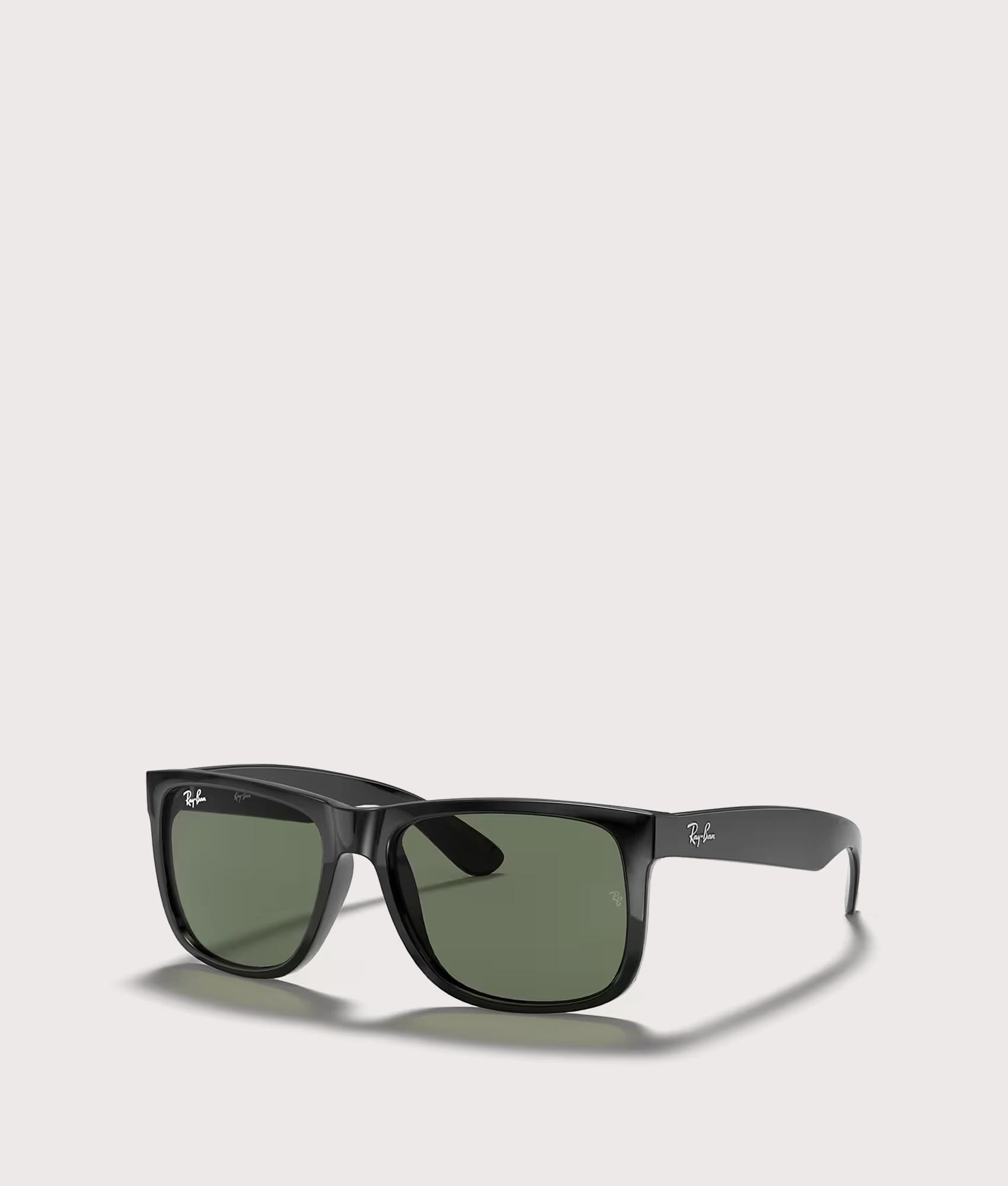 Justin Classic Sunglasses in Polished Black Dark Green Lenses by Ray-Ban. Shot by EQVVS. Front Detail Shot.
