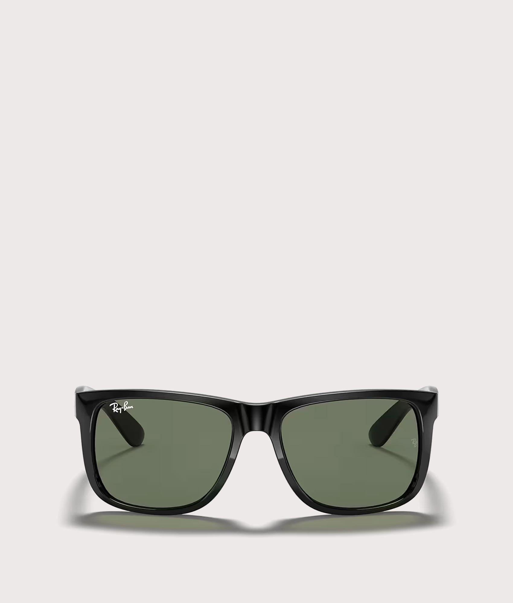 Justin Classic Sunglasses in Polished Black Dark Green Lenses by Ray-Ban. Shot by EQVVS. Front Shot.